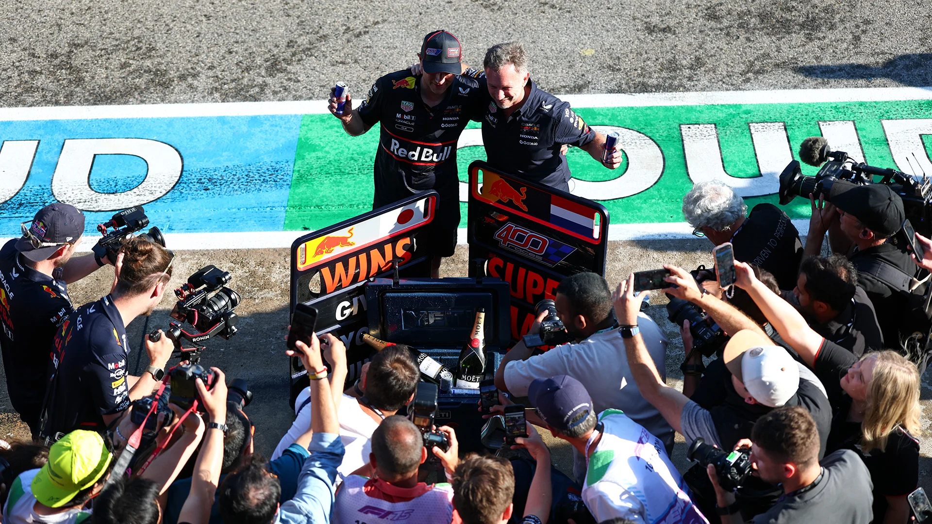 verstappen-horner-imola-win-2025.png