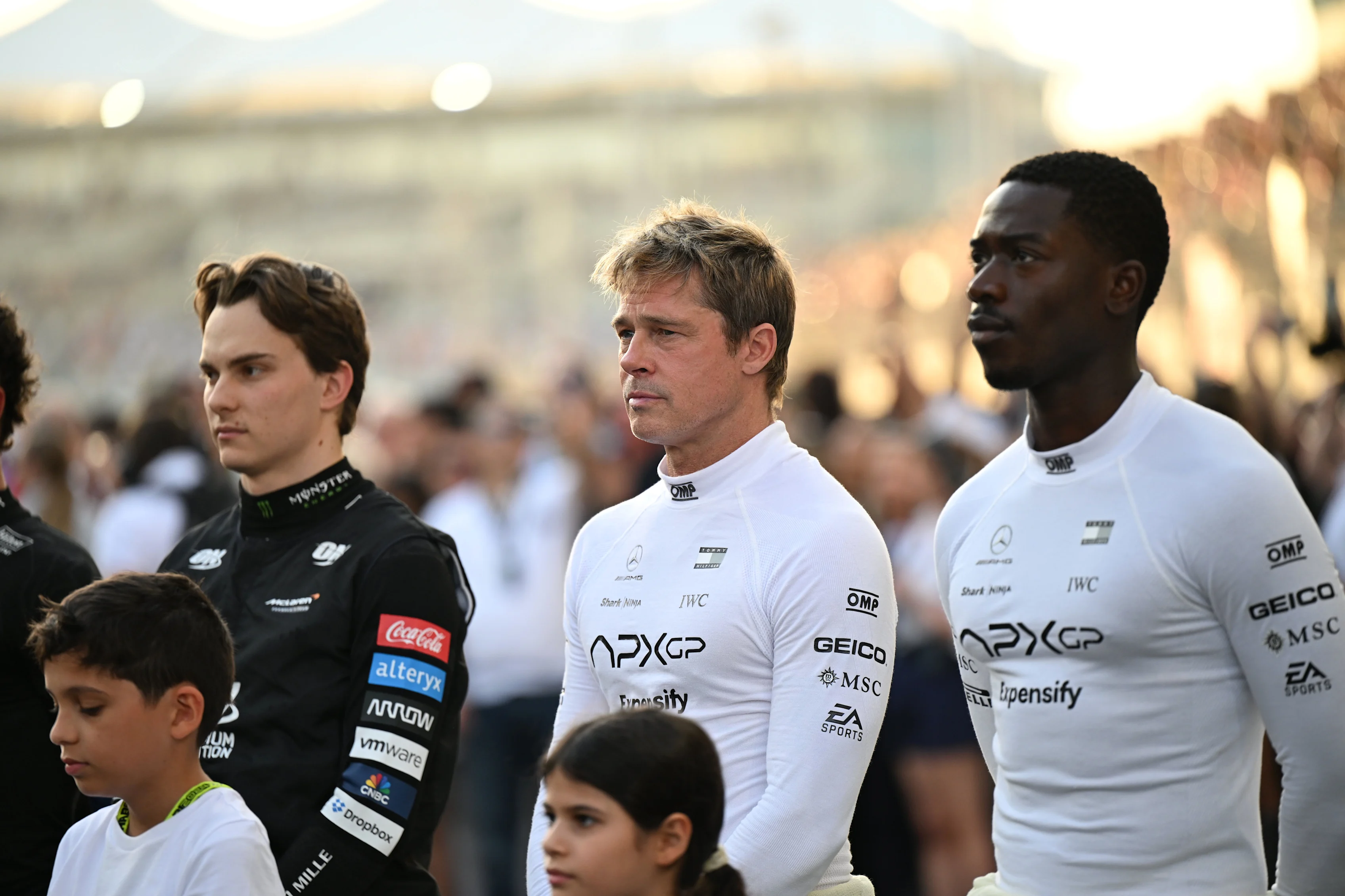 ABU DHABI, UNITED ARAB EMIRATES - DECEMBER 08: Brad Pitt and Damson Idris with Oscar Piastri,