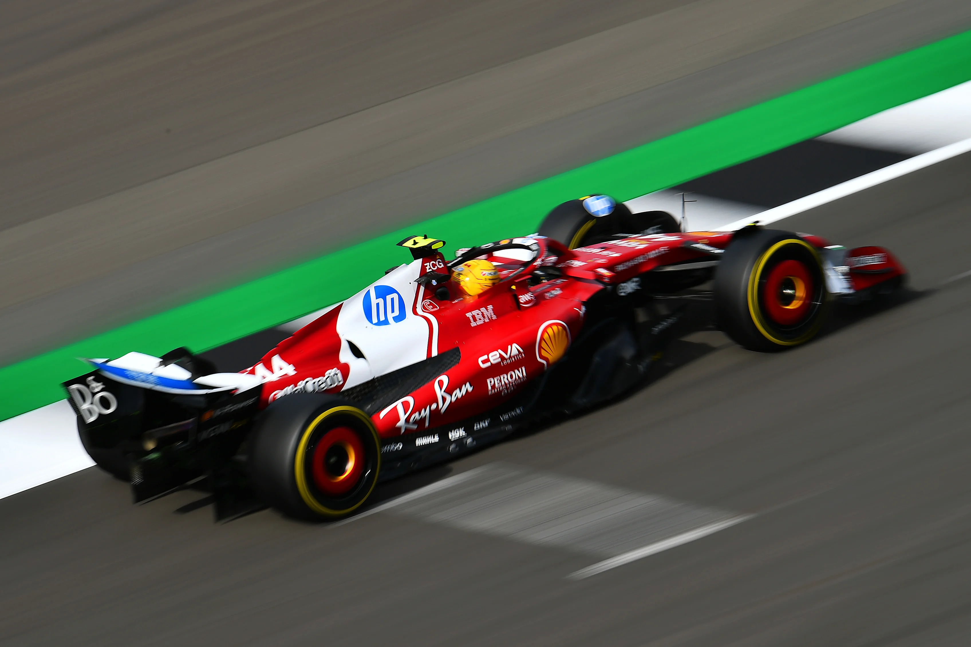 NORTHAMPTON, ENGLAND - JULY 04: Lewis Hamilton of Great Britain driving the (44) Scuderia Ferrari