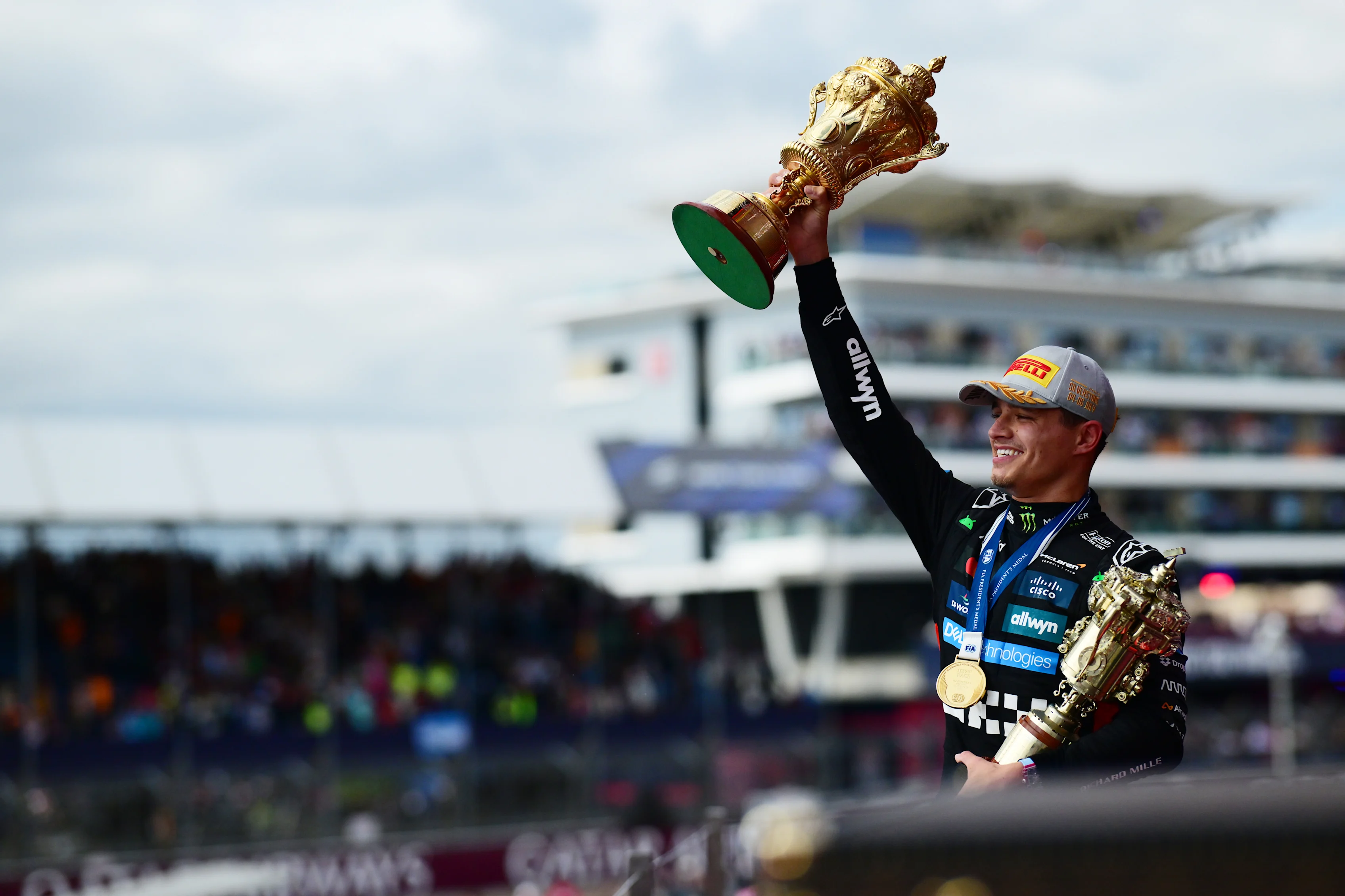 NORTHAMPTON, ENGLAND - JULY 06: Race winner Lando Norris of Great Britain and McLaren on the podium