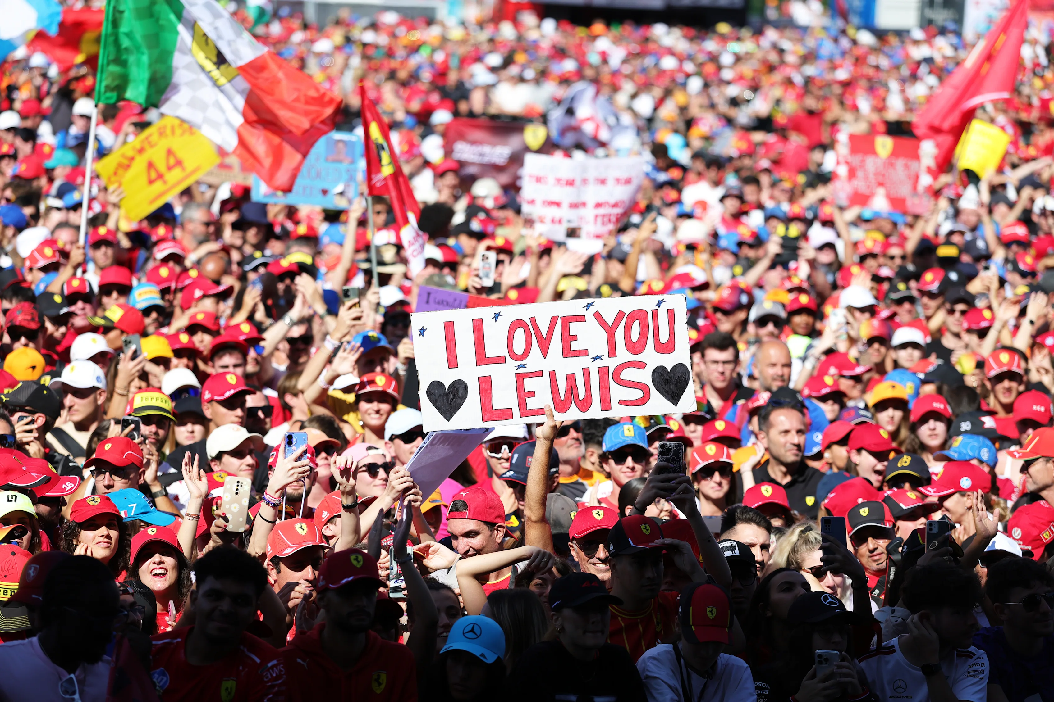 MONZA, ITALY - SEPTEMBER 06: Fans of Lewis Hamilton of Great Britain and Scuderia Ferrari gathered