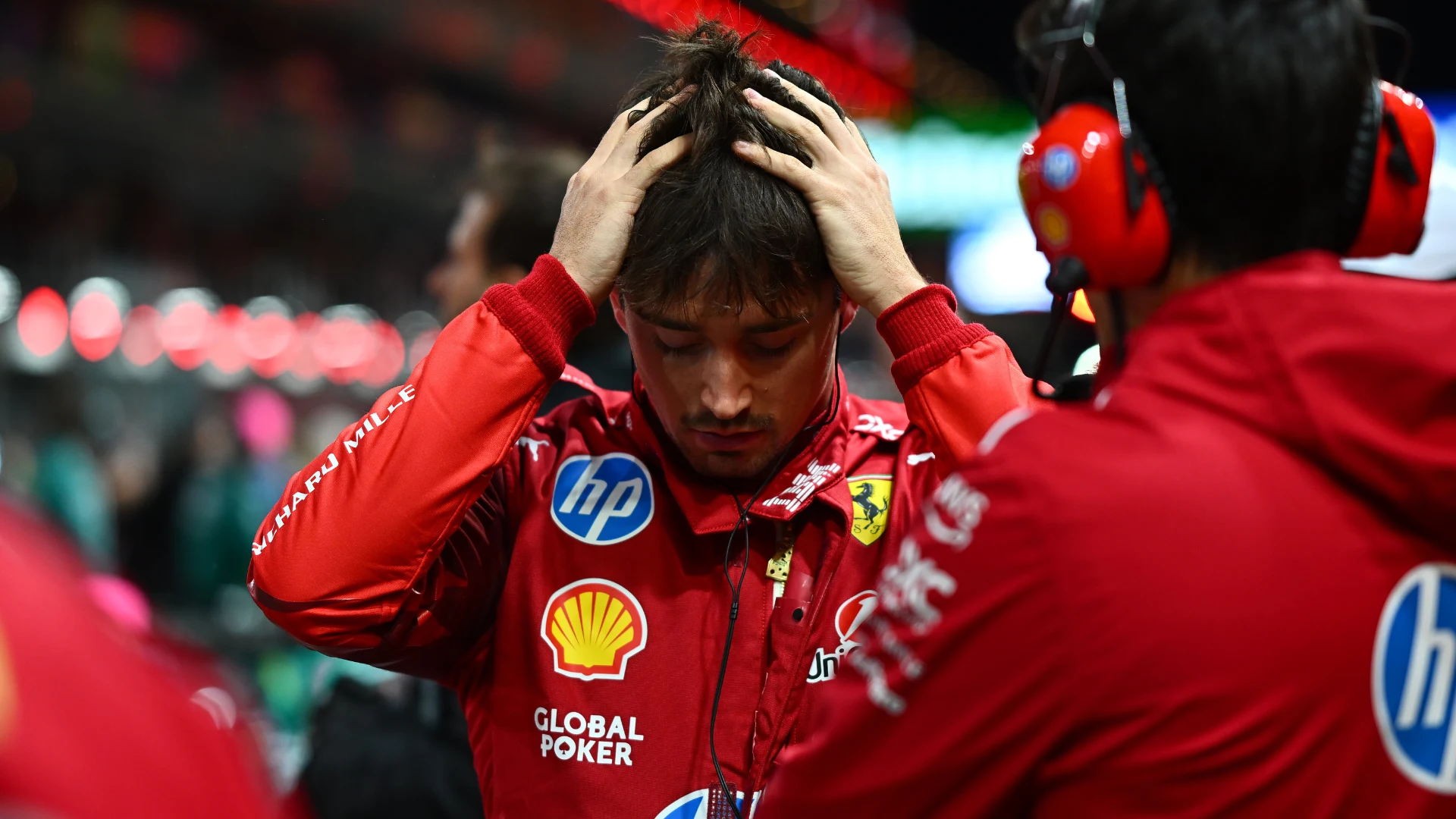 LAS VEGAS, NEVADA - NOVEMBER 22: Charles Leclerc of Monaco and Scuderia Ferrari and Lewis Hamilton