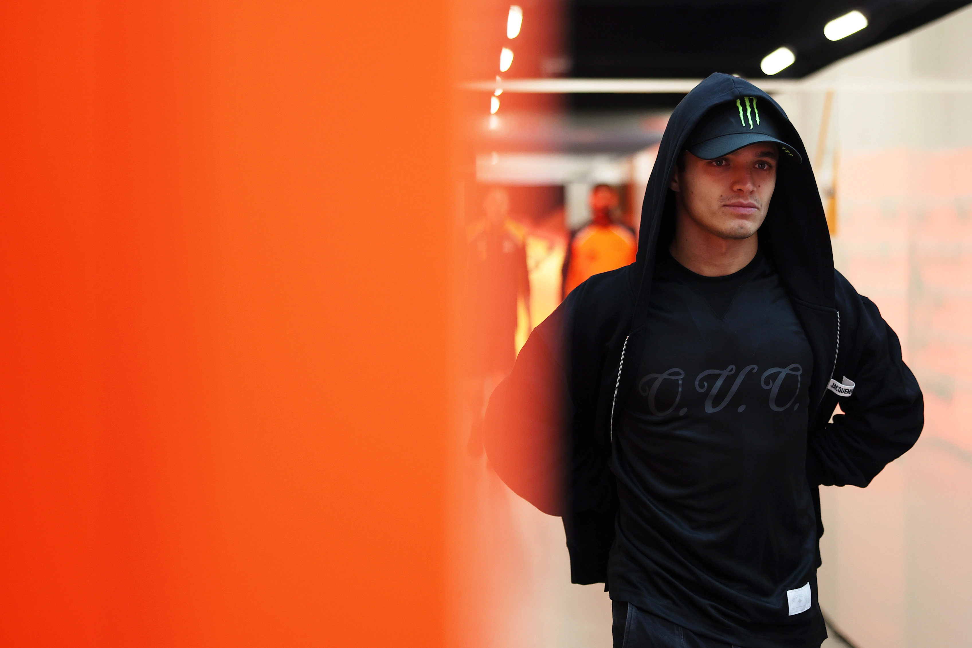LAS VEGAS, NEVADA - NOVEMBER 19: Lando Norris of Great Britain and McLaren walks in the garage