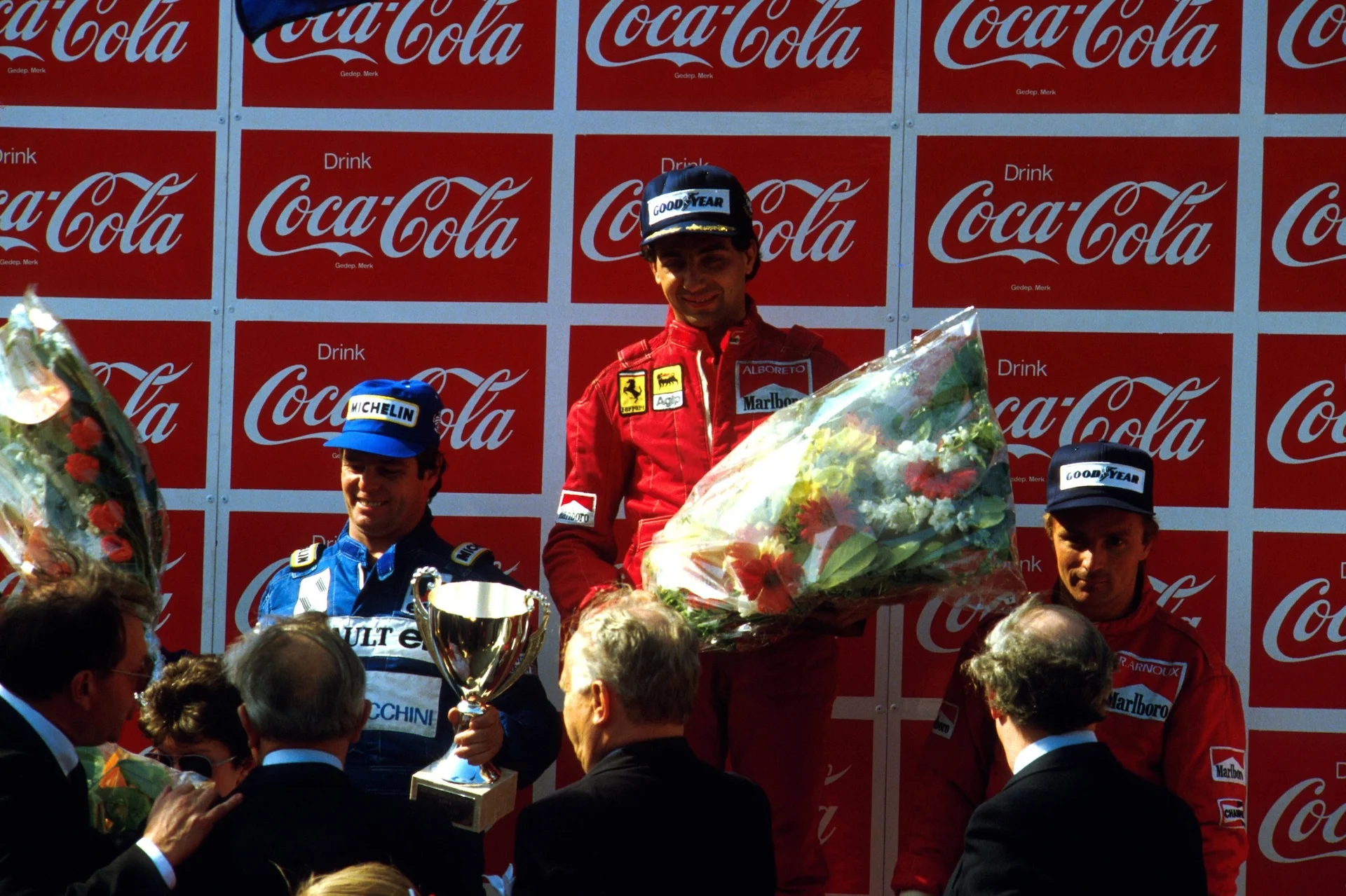 (L to R) 2nd placed Derek Warwick (GBR). Winner Michele Alboreto (ITA). 3rd placed Rene Arnoux