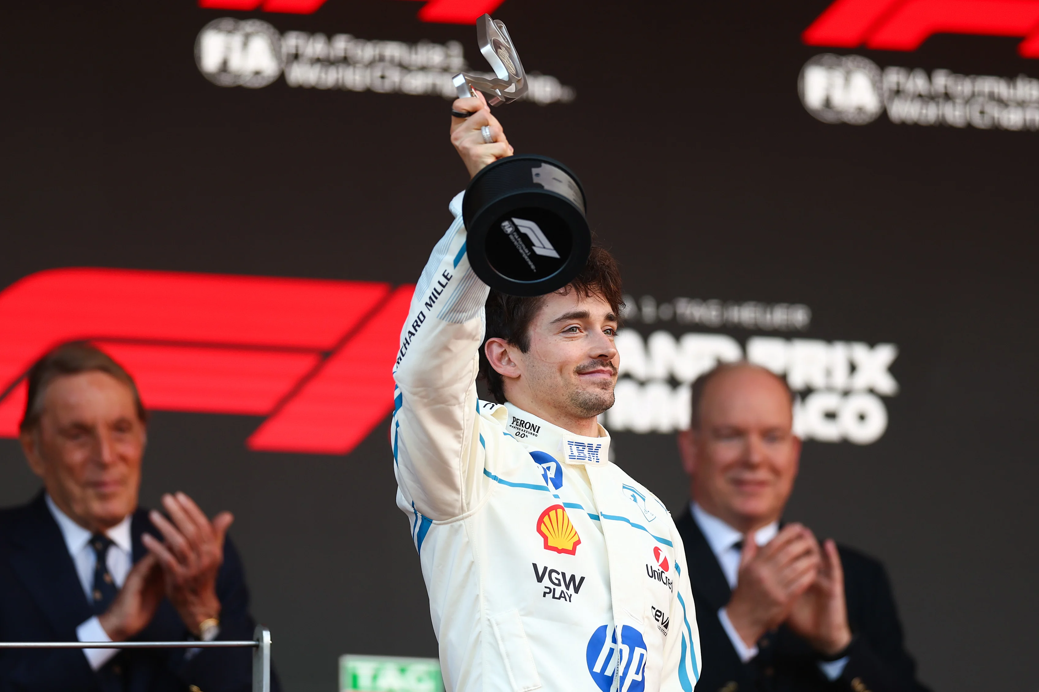 MONTE-CARLO, MONACO - MAY 25: Second placed Charles Leclerc of Monaco and Scuderia Ferrari lifts