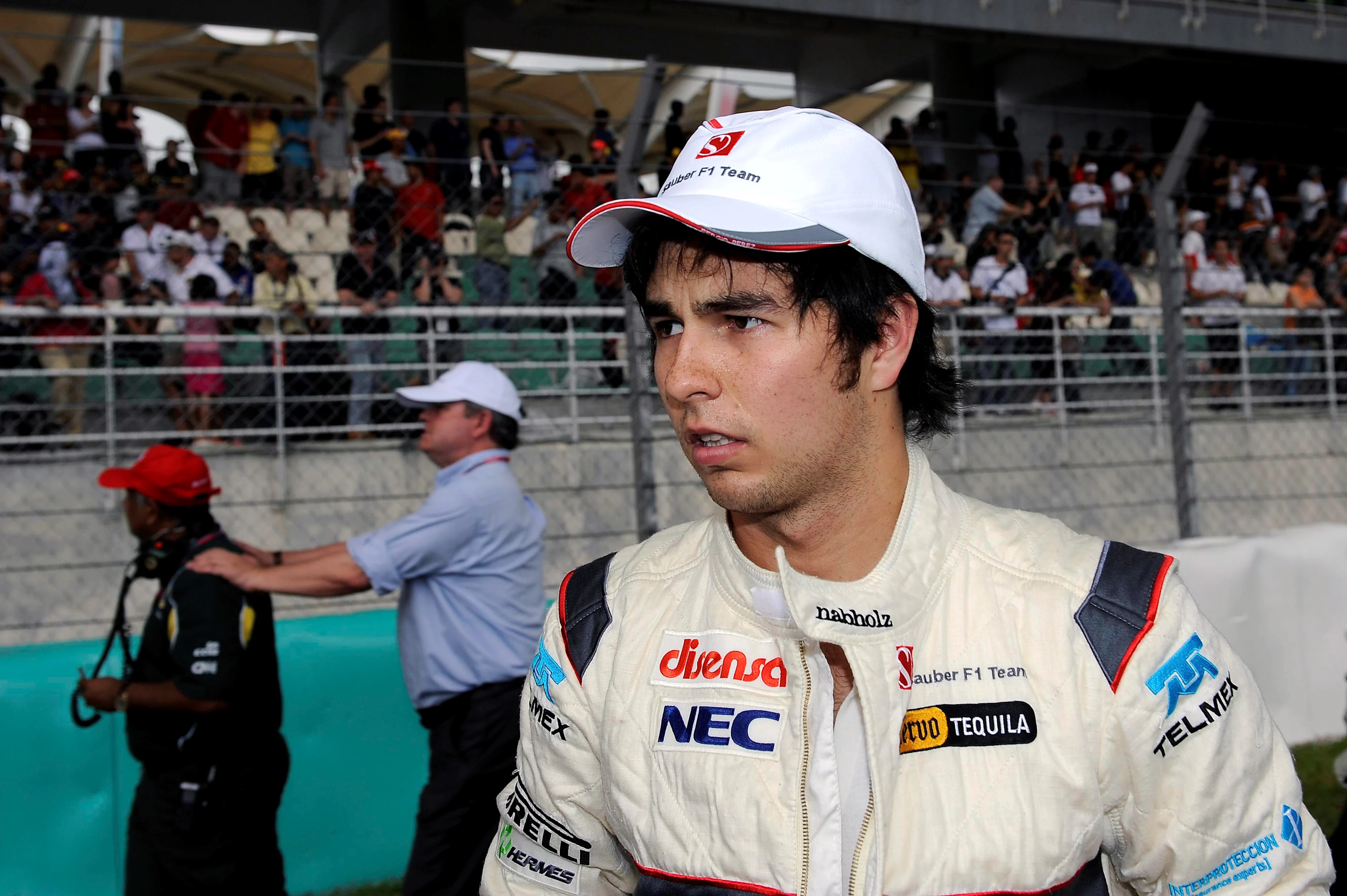 Sergio Perez (MEX) Sauber on the grid. Formula One World Championship, Rd 2, Malaysian Grand Prix,