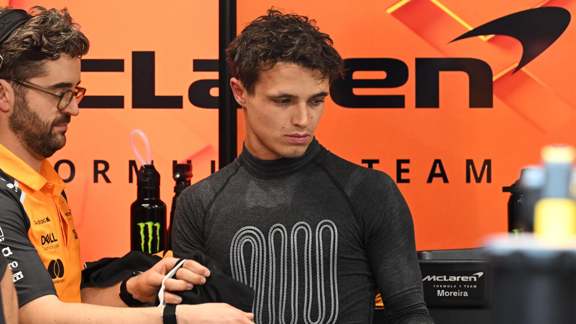 SINGAPORE, SINGAPORE - OCTOBER 03: Lando Norris of Great Britain and McLaren arrives in the Paddock