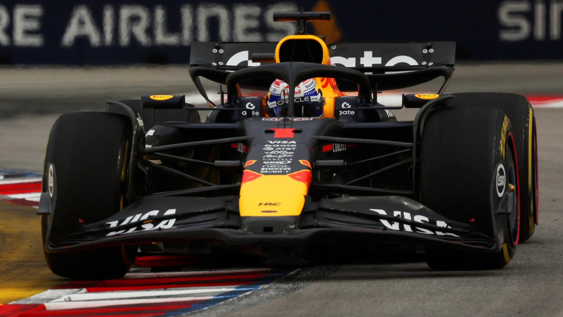SINGAPORE, SINGAPORE - OCTOBER 04: Max Verstappen of the Netherlands driving the (1) Oracle Red