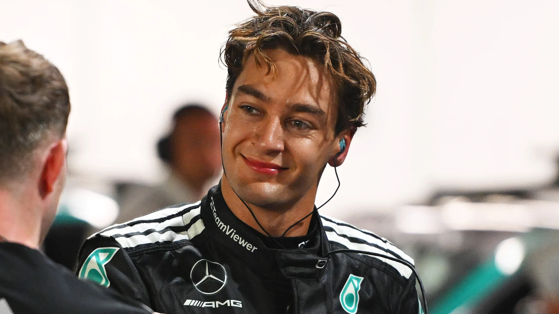 SINGAPORE, SINGAPORE - OCTOBER 04: Pole position qualifier George Russell of Great Britain and
