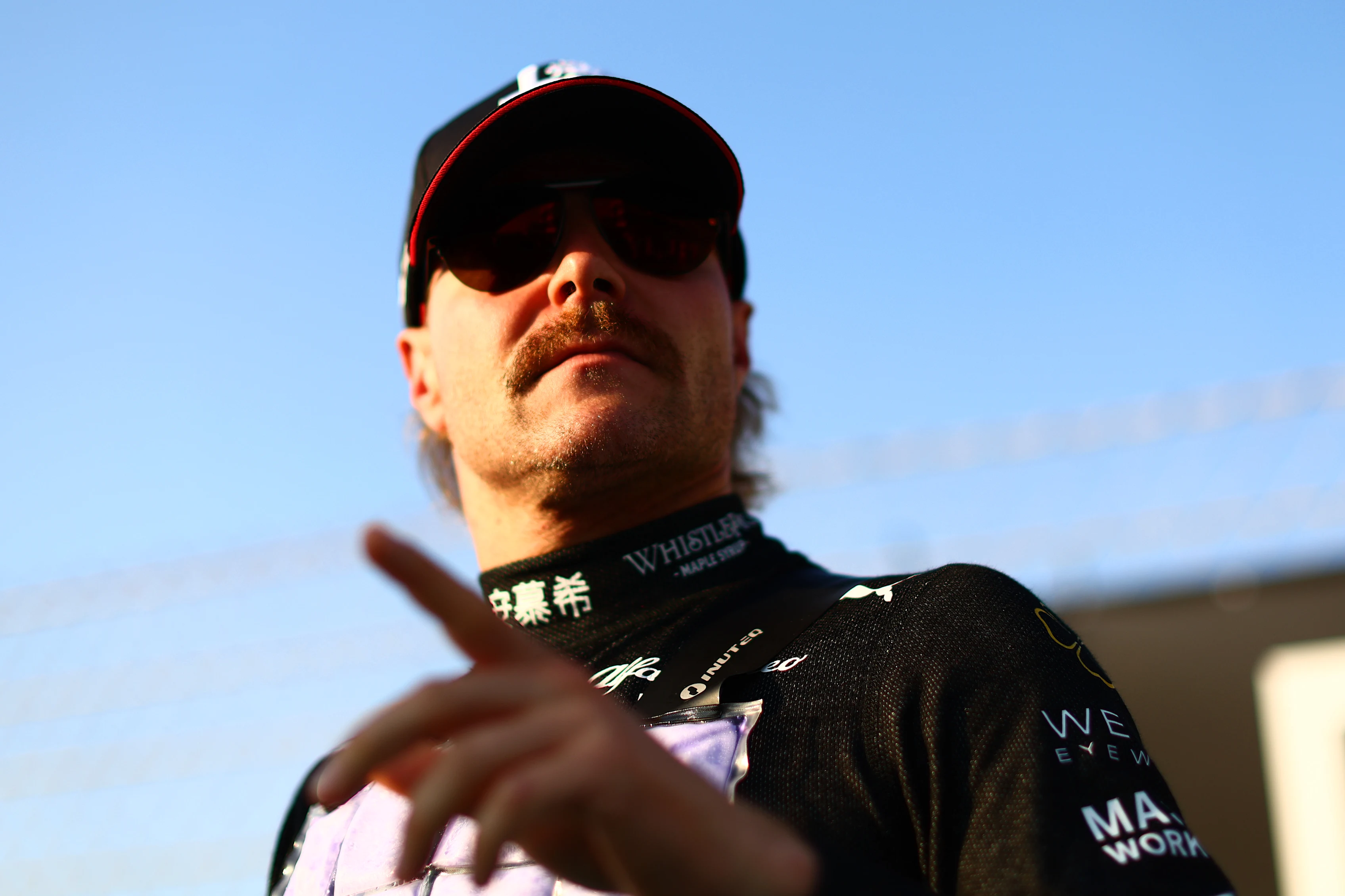 ABU DHABI, UNITED ARAB EMIRATES - NOVEMBER 26: Valtteri Bottas of Finland and Alfa Romeo F1 prepares to drive on the grid prior to the F1 Grand Prix of Abu Dhabi at Yas Marina Circuit on November 26, 2023 in Abu Dhabi, United Arab Emirates. (Photo by Clive Rose/Getty Images)
