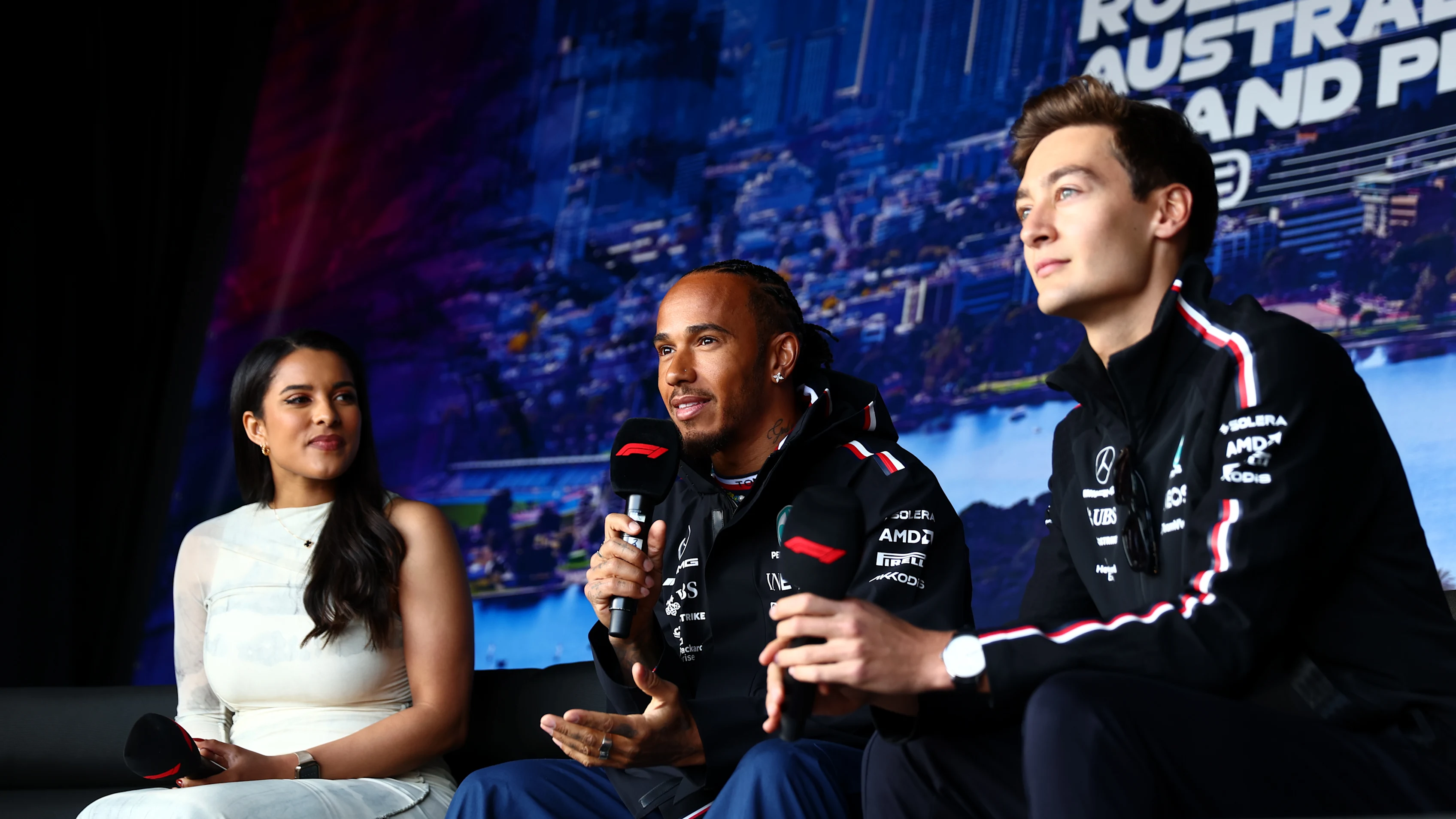 MELBOURNE, AUSTRALIA - APRIL 01: Lewis Hamilton of Great Britain and Mercedes and George Russell of