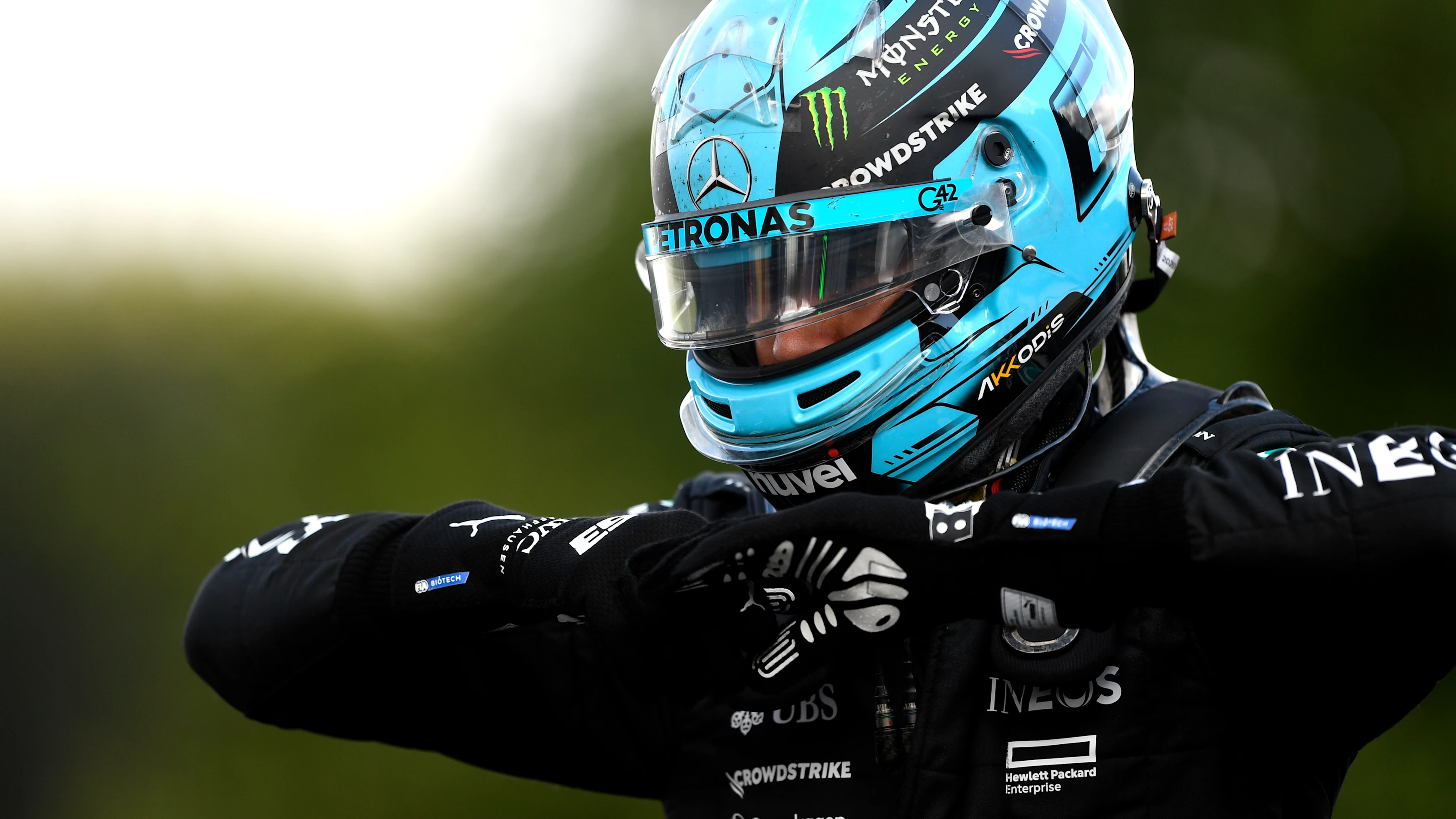 SPA, BELGIUM - JULY 28: 8th placed qualifier George Russell of Great Britain and Mercedes walks in