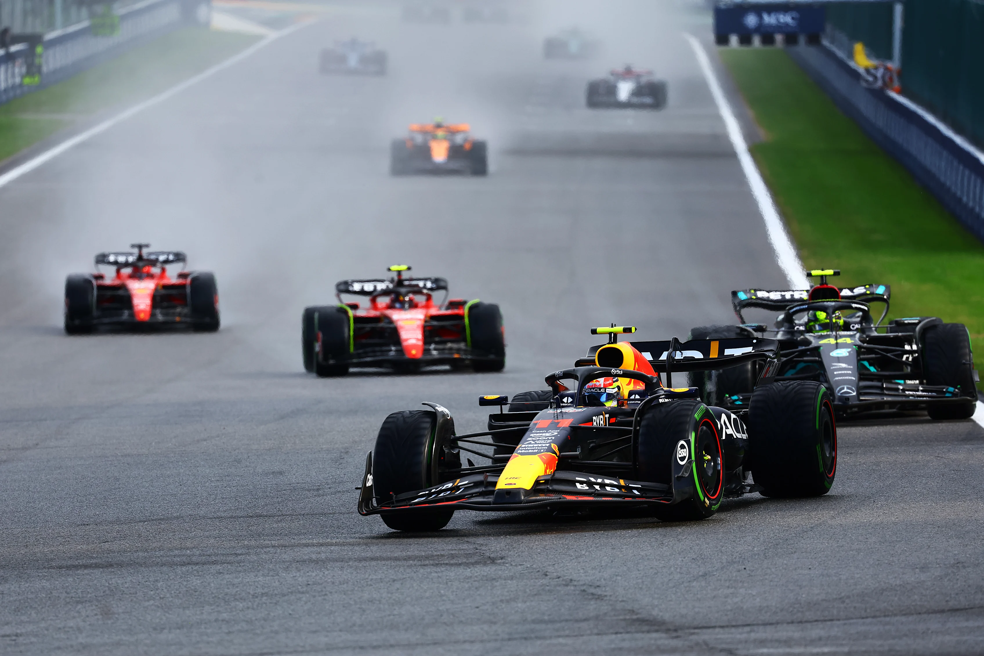 SPA, BELGIUM - JULY 29: Sergio Perez of Mexico driving the (11) Oracle Red Bull Racing RB19 leads
