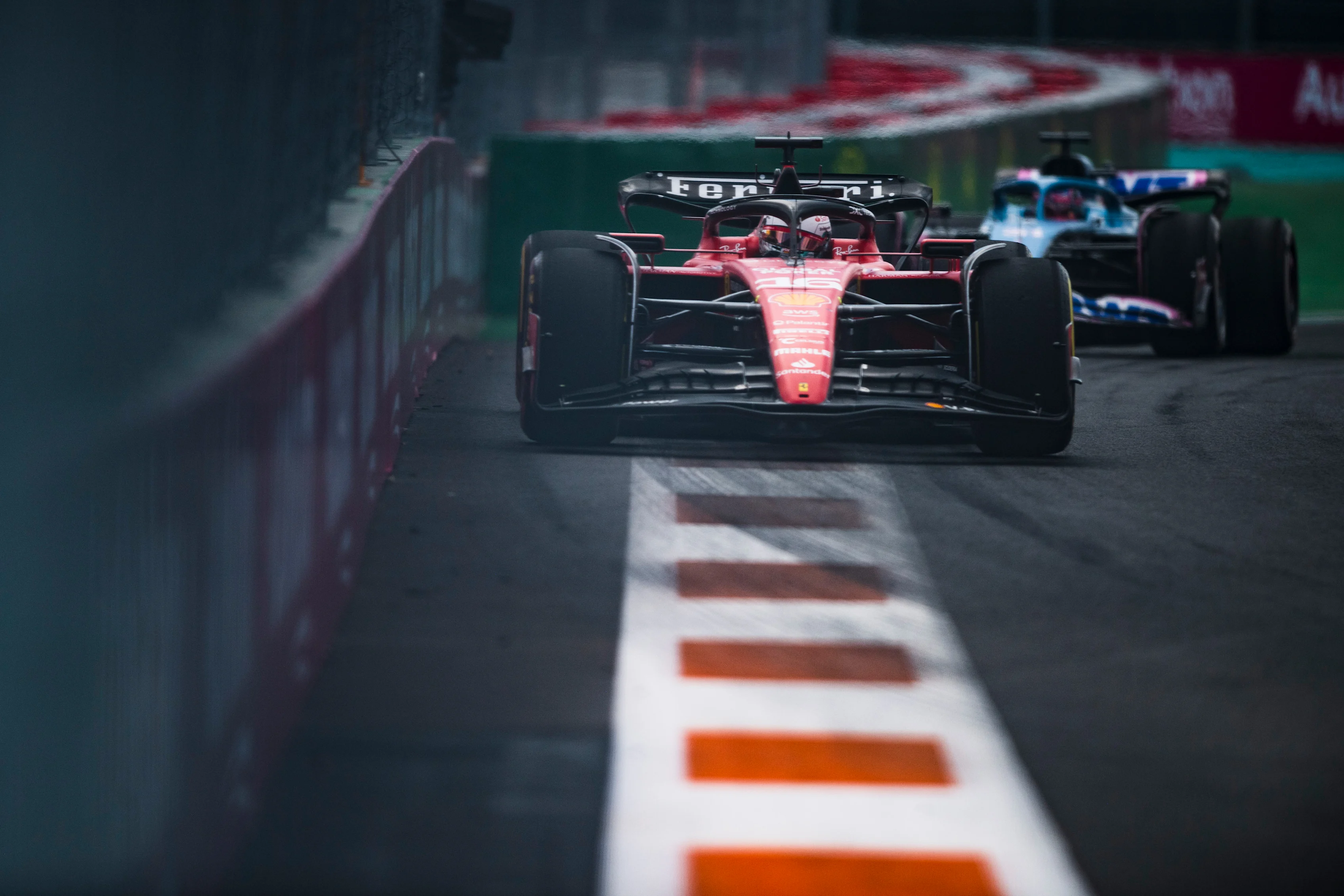 MIAMI, FLORIDA - MAY 07: Charles Leclerc of Monaco driving the (16) Ferrari SF-23 leads Esteban