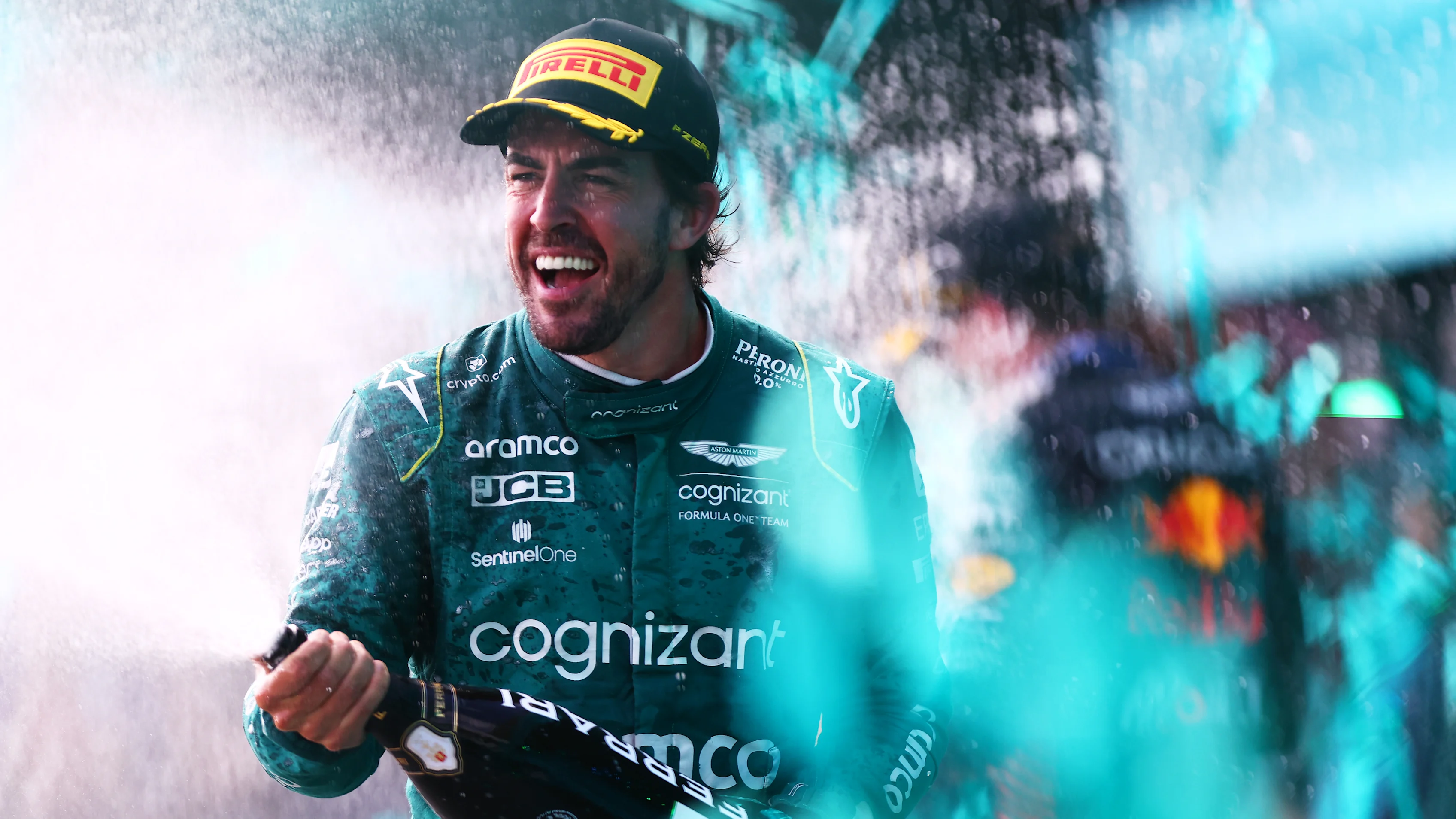 MIAMI, FLORIDA - MAY 07: Third placed Fernando Alonso of Spain and Aston Martin F1 Team celebrates