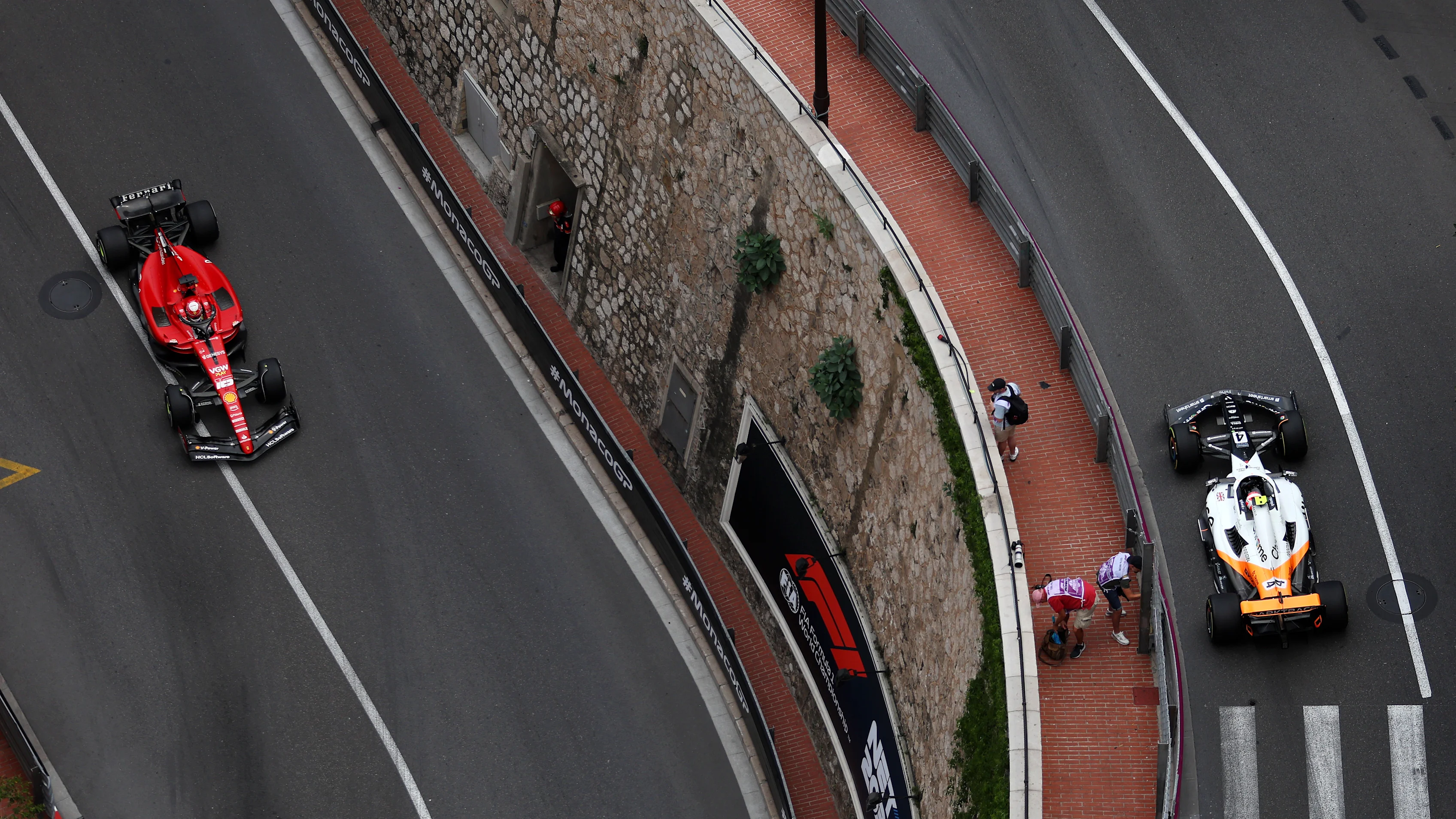 MONTE-CARLO, MONACO - MAY 28: Charles Leclerc of Monaco driving the (16) Ferrari SF-23 leads Lando Norris of Great Britain driving the (4) McLaren MCL60 Mercedes on track  during the F1 Grand Prix of Monaco at Circuit de Monaco on May 28, 2023 in Monte-Carlo, Monaco. (Photo by Bryn Lennon - Formula 1/Formula 1 via Getty Images)