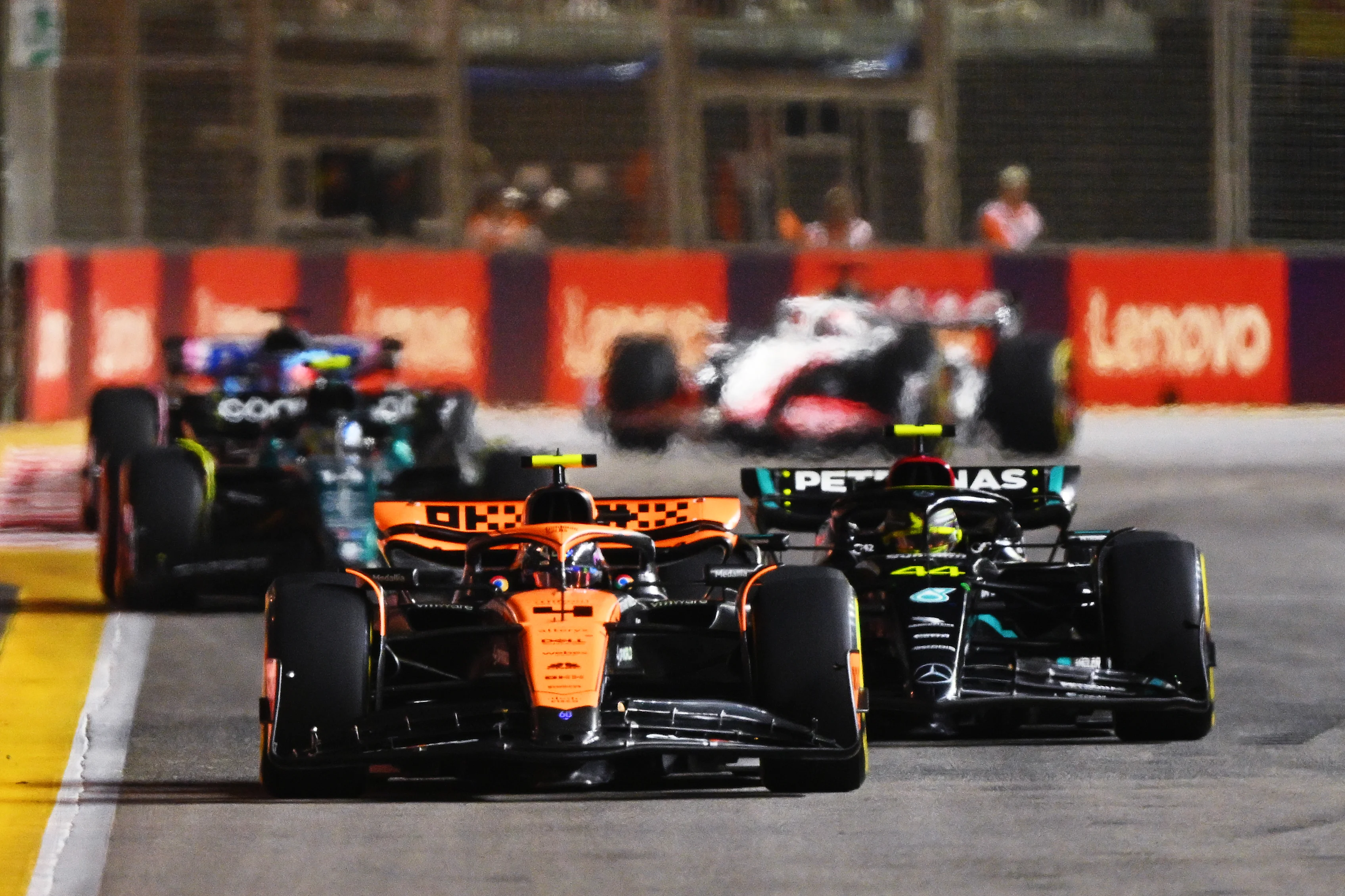 SINGAPORE, SINGAPORE - SEPTEMBER 17: Lando Norris of Great Britain driving the (4) McLaren MCL60