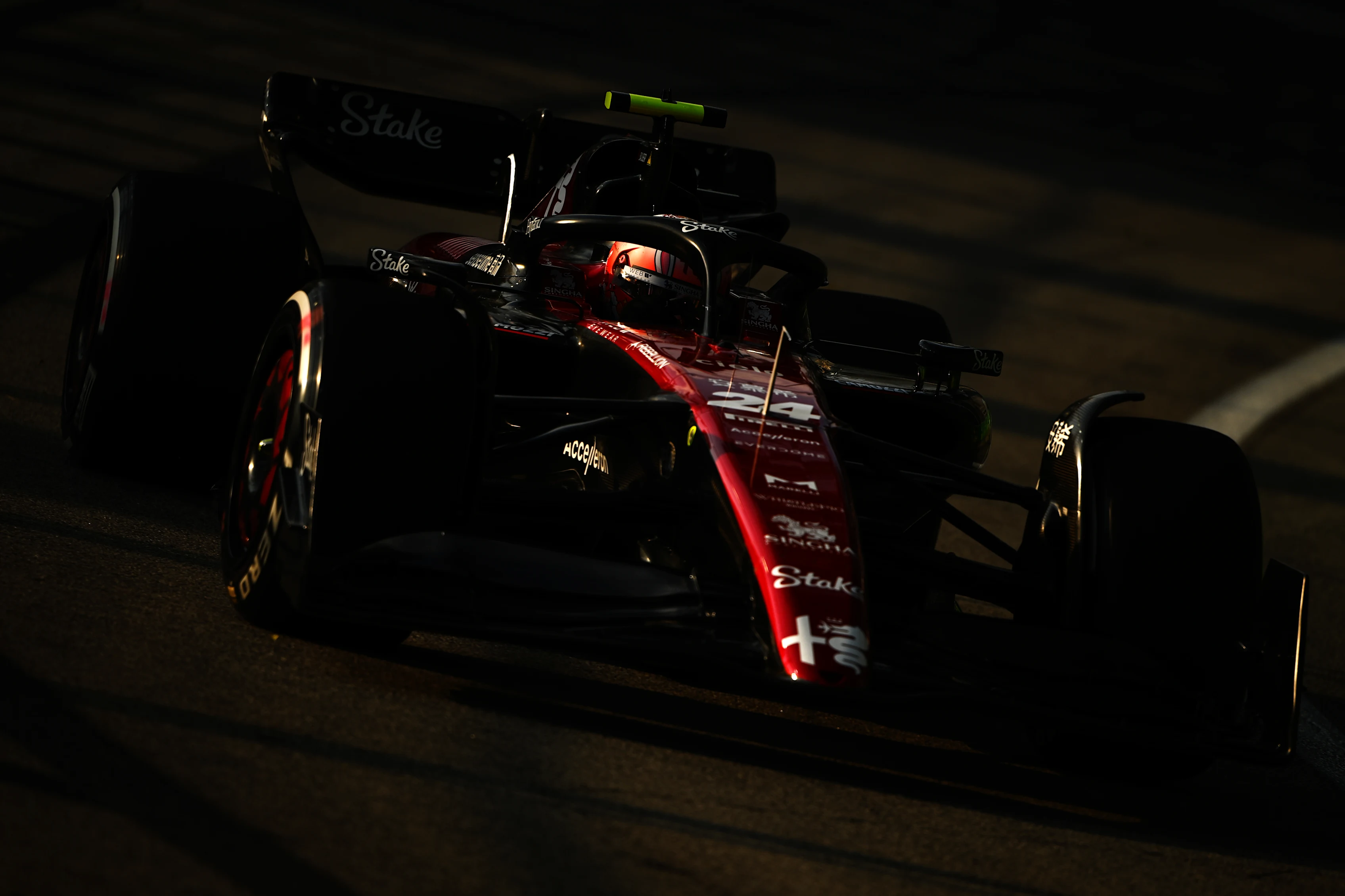 SINGAPORE, SINGAPORE - SEPTEMBER 15: Zhou Guanyu of China driving the (24) Alfa Romeo F1 C43 Ferrari on track during practice ahead of the F1 Grand Prix of Singapore at Marina Bay Street Circuit on September 15, 2023 in Singapore, Singapore. (Photo by Clive Mason/Getty Images)