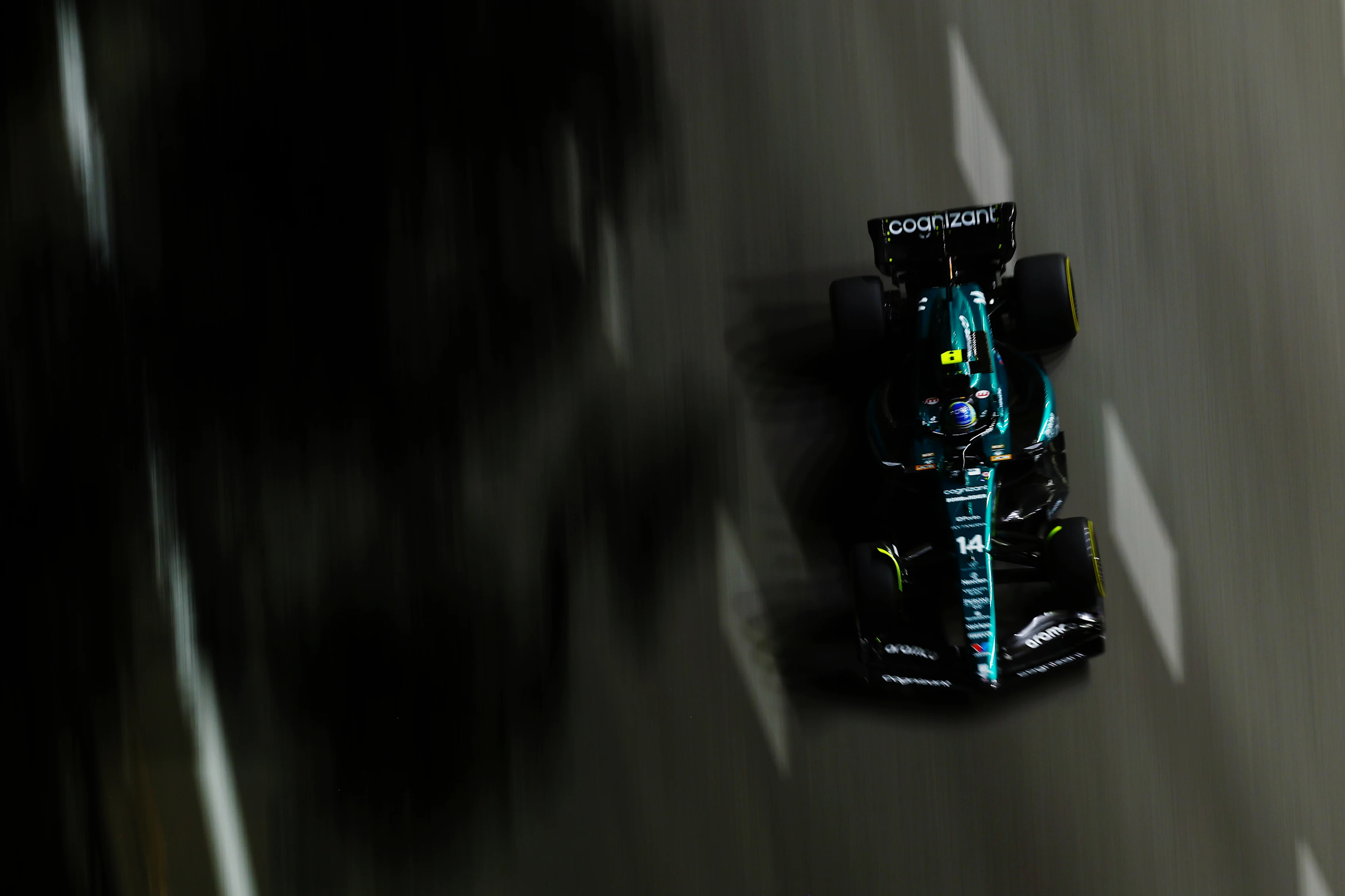 SINGAPORE, SINGAPORE - SEPTEMBER 15: Fernando Alonso of Spain driving the (14) Aston Martin AMR23 Mercedes on track during practice ahead of the F1 Grand Prix of Singapore at Marina Bay Street Circuit on September 15, 2023 in Singapore, Singapore. (Photo by Mark Thompson/Getty Images)