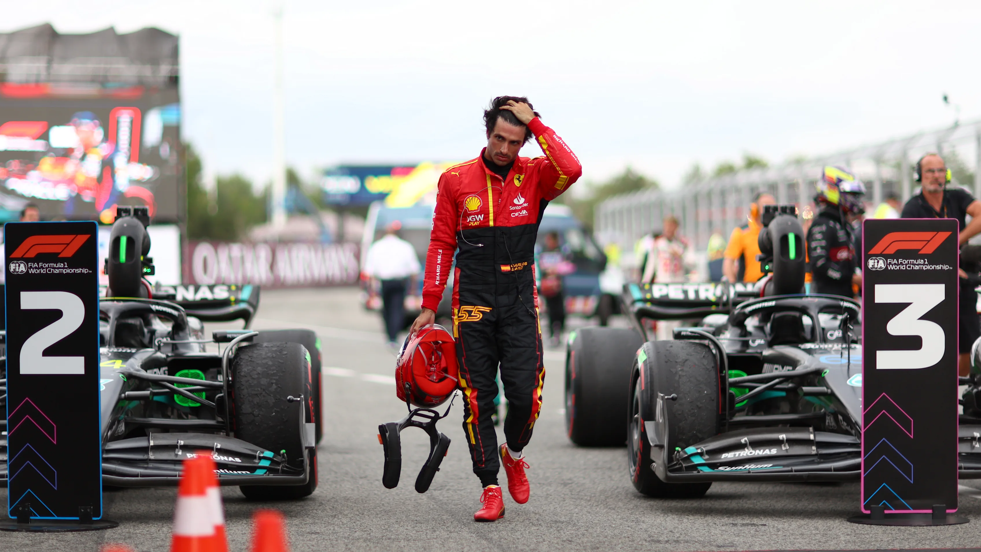 BARCELONA, SPAIN - JUNE 04: fifth placed Carlos Sainz of Spain and Ferrari walks in parc ferme during the F1 Grand Prix of Spain at Circuit de Barcelona-Catalunya on June 04, 2023 in Barcelona, Spain. (Photo by Dan Istitene - Formula 1/Formula 1 via Getty Images)