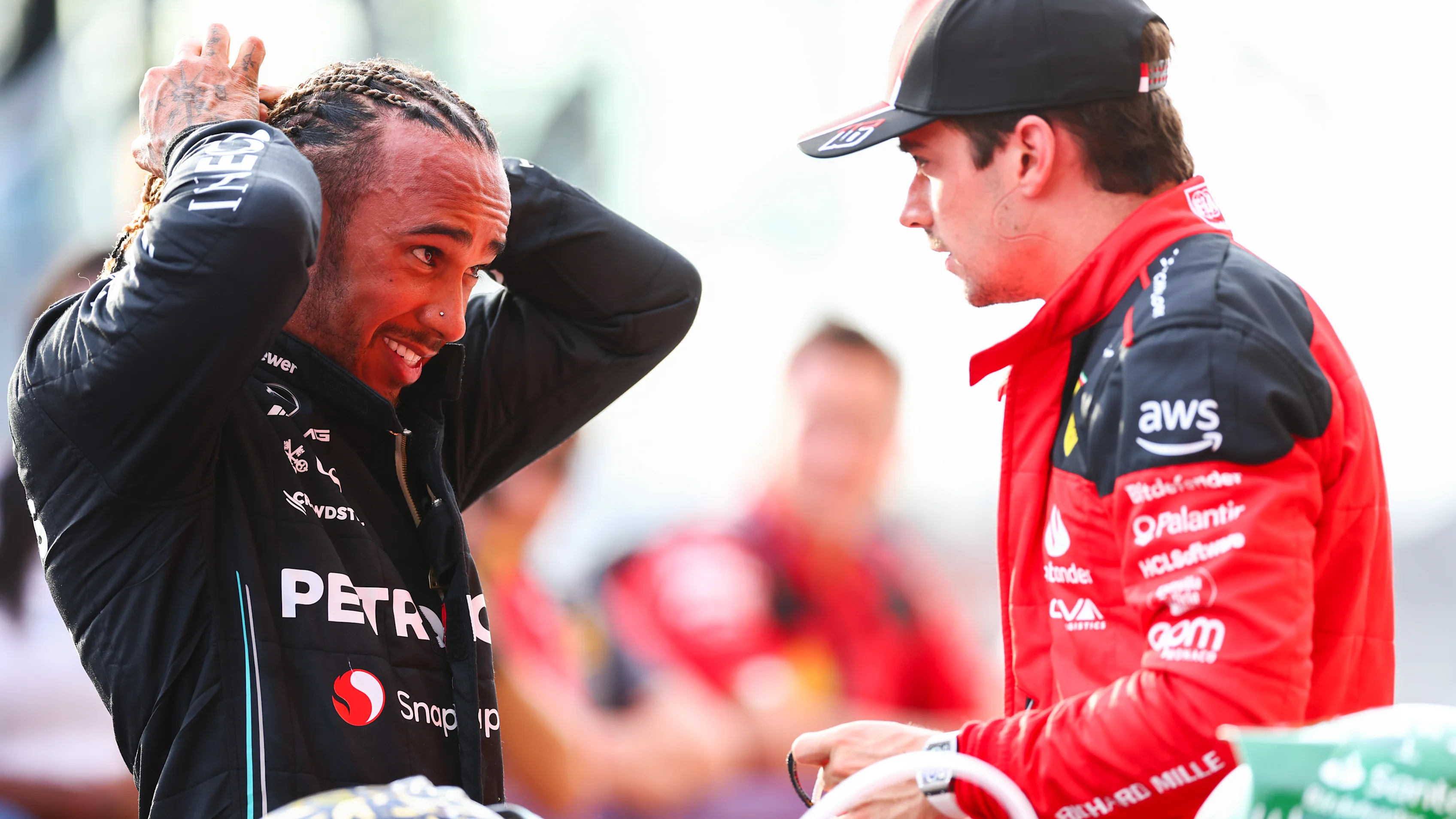 AUSTIN, TEXAS - OCTOBER 21: Second placed Lewis Hamilton of Great Britain and Mercedes talks with