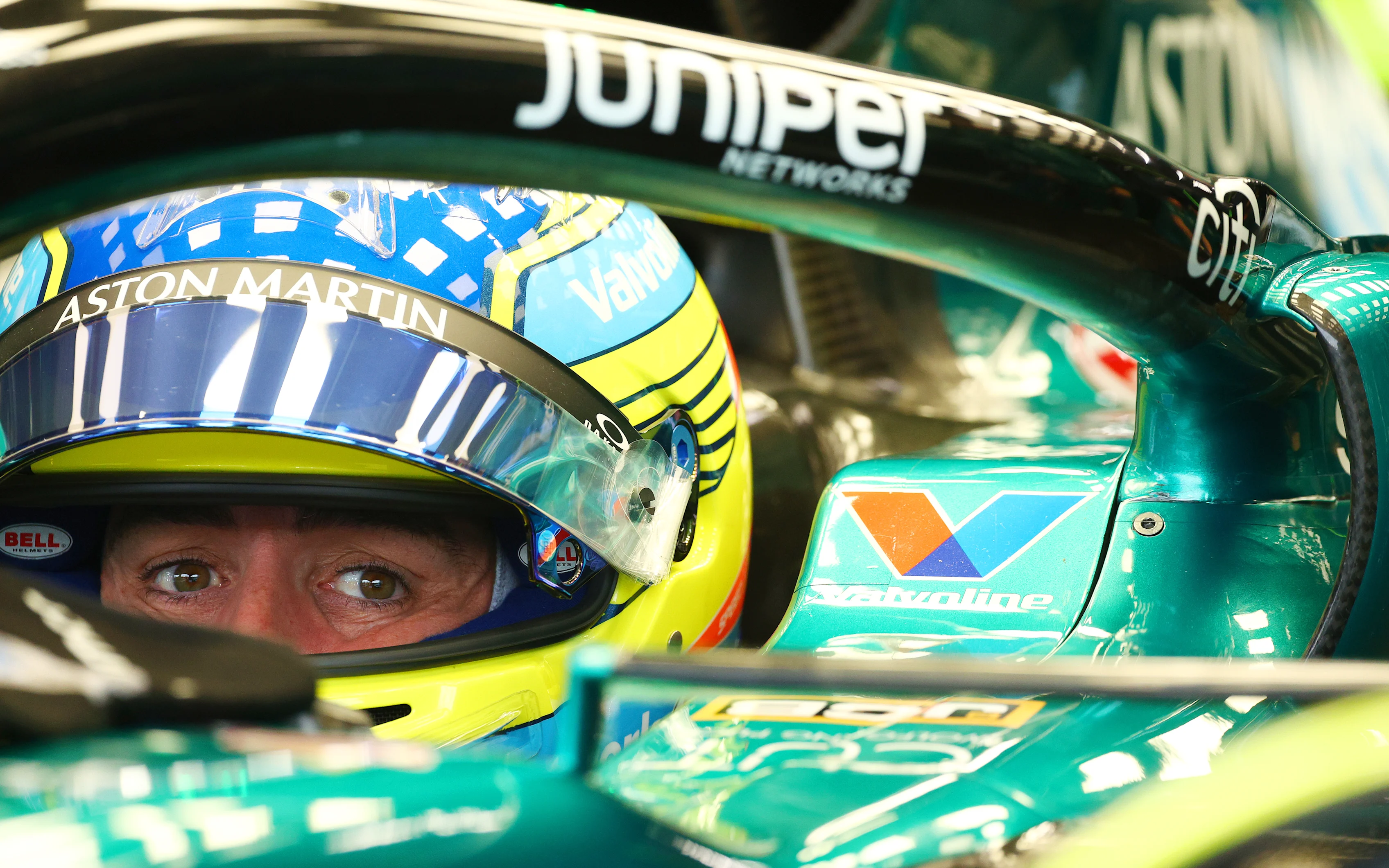 SINGAPORE, SINGAPORE - SEPTEMBER 21: Fernando Alonso of Spain and Aston Martin F1 Team prepares to drive in the garage during final practice ahead of the F1 Grand Prix of Singapore at Marina Bay Street Circuit on September 21, 2024 in Singapore, Singapore. (Photo by Clive Rose - Formula 1/Formula 1 via Getty Images)