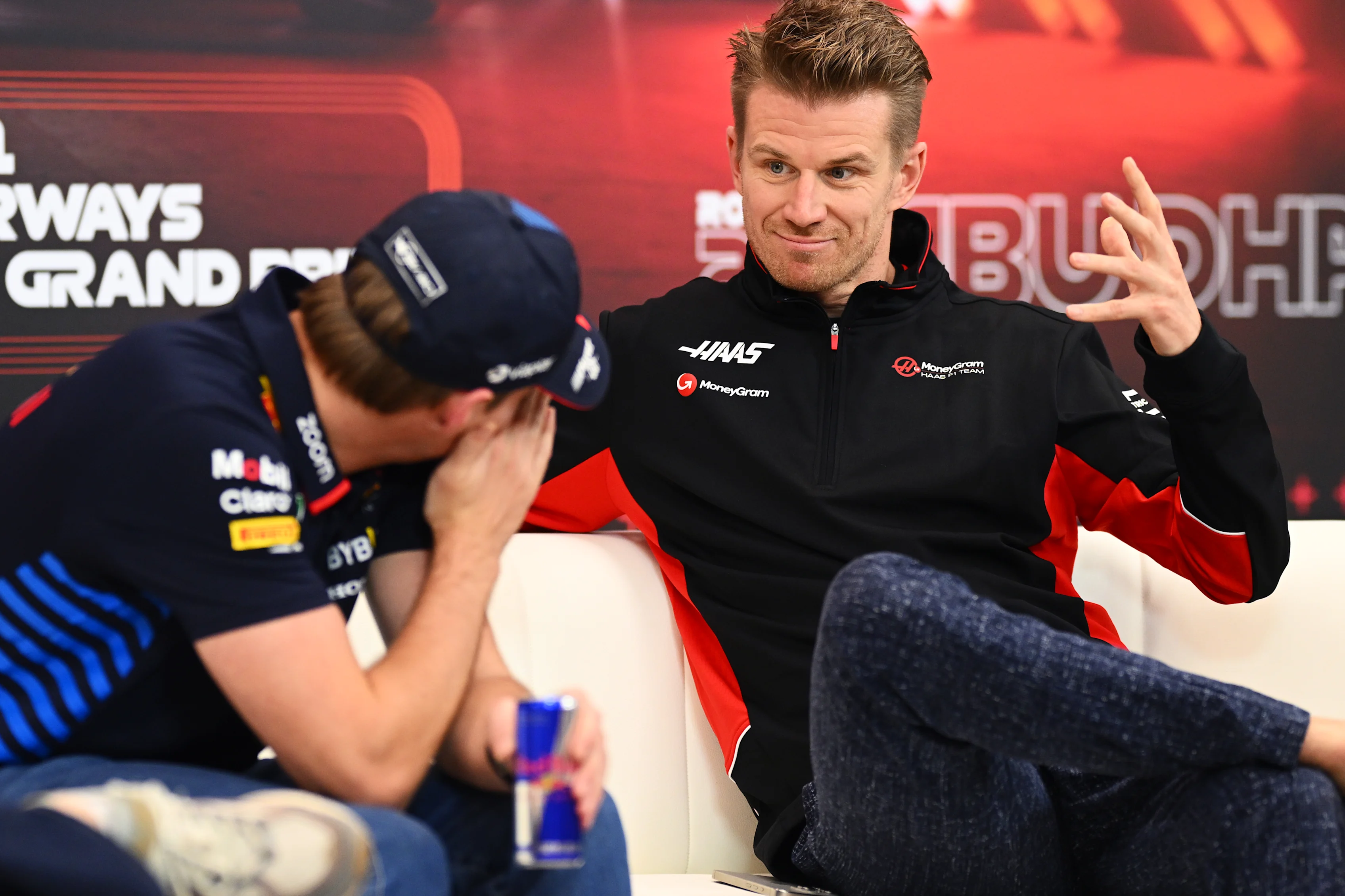 ABU DHABI, UNITED ARAB EMIRATES - DECEMBER 05: Max Verstappen of the Netherlands and Oracle Red Bull Racing and Nico Hulkenberg of Germany and Haas F1 attend the Drivers Press Conference during previews ahead of the F1 Grand Prix of Abu Dhabi at Yas Marina Circuit on December 05, 2024 in Abu Dhabi, United Arab Emirates. (Photo by Clive Mason/Getty Images)