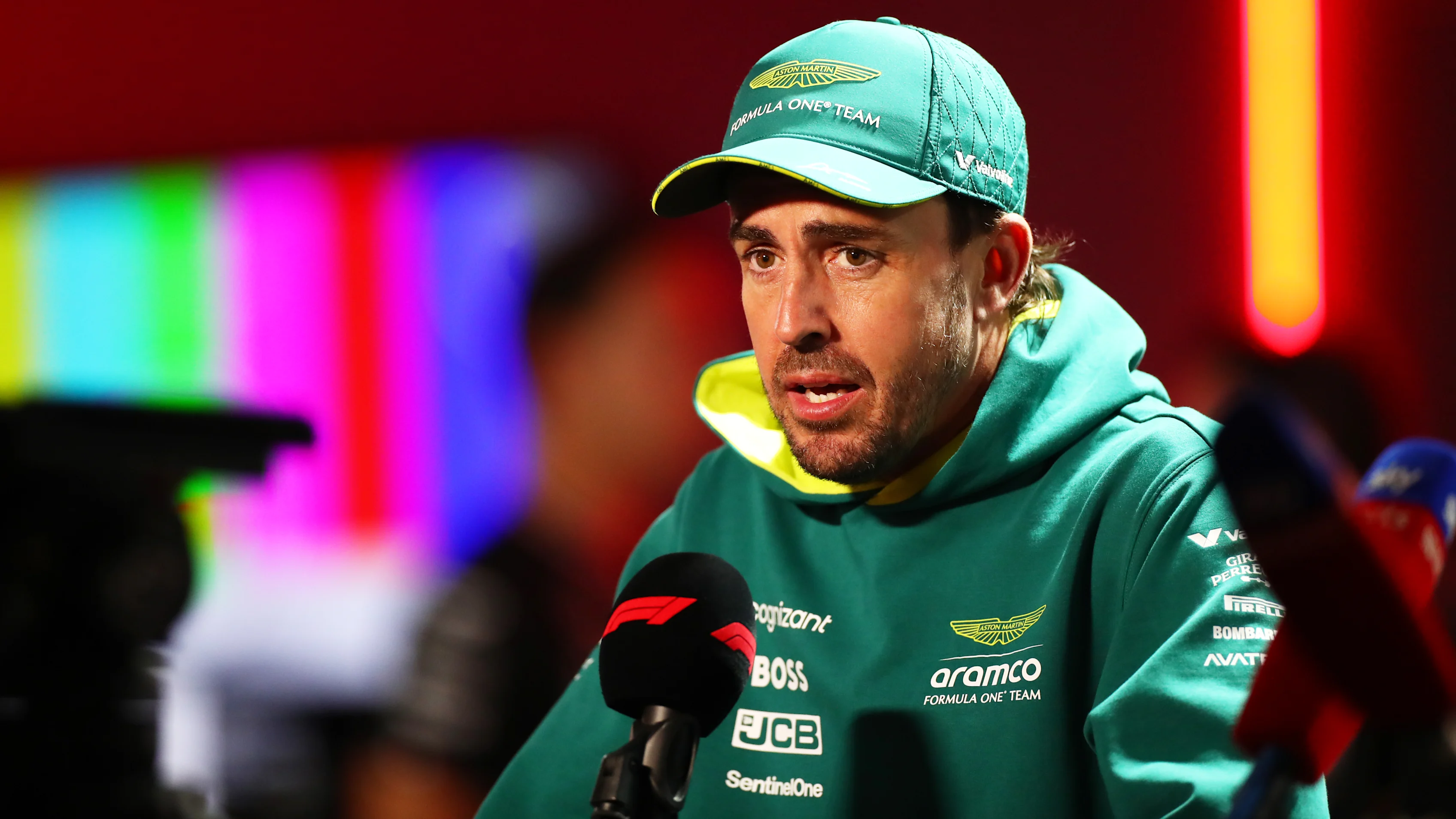 BAHRAIN, BAHRAIN - FEBRUARY 29: Fernando Alonso of Spain and Aston Martin F1 Team talks to the