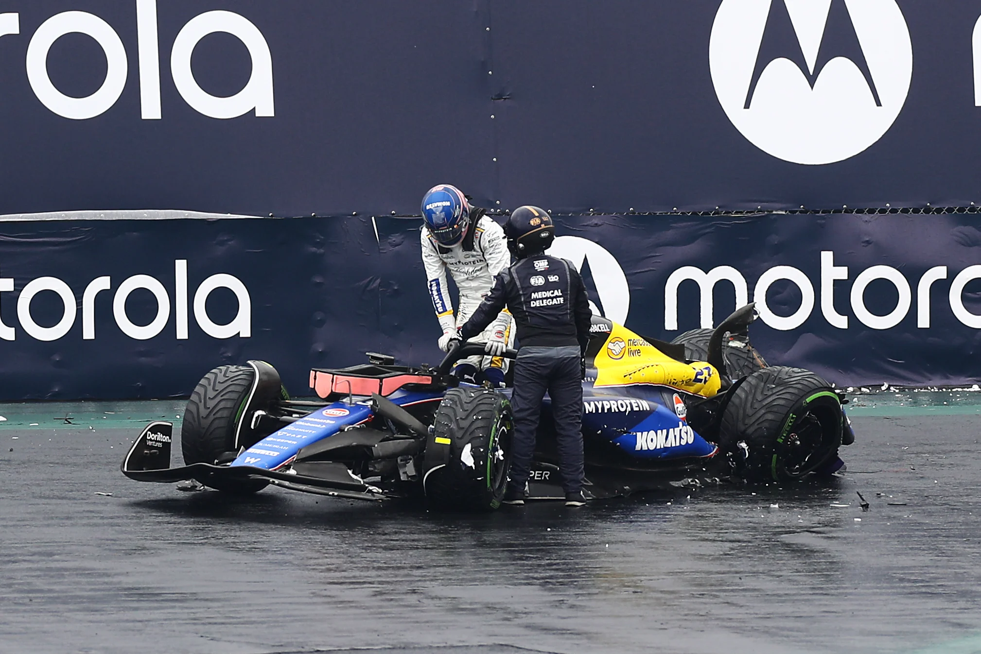 SAO PAULO, BRAZIL - NOVEMBER 03: Alexander Albon of Thailand and Williams climbs from his car after crashing during qualifying ahead of the F1 Grand Prix of Brazil at Autodromo Jose Carlos Pace on November 03, 2024 in Sao Paulo, Brazil. (Photo by Peter Fox - Formula 1/Formula 1 via Getty Images)