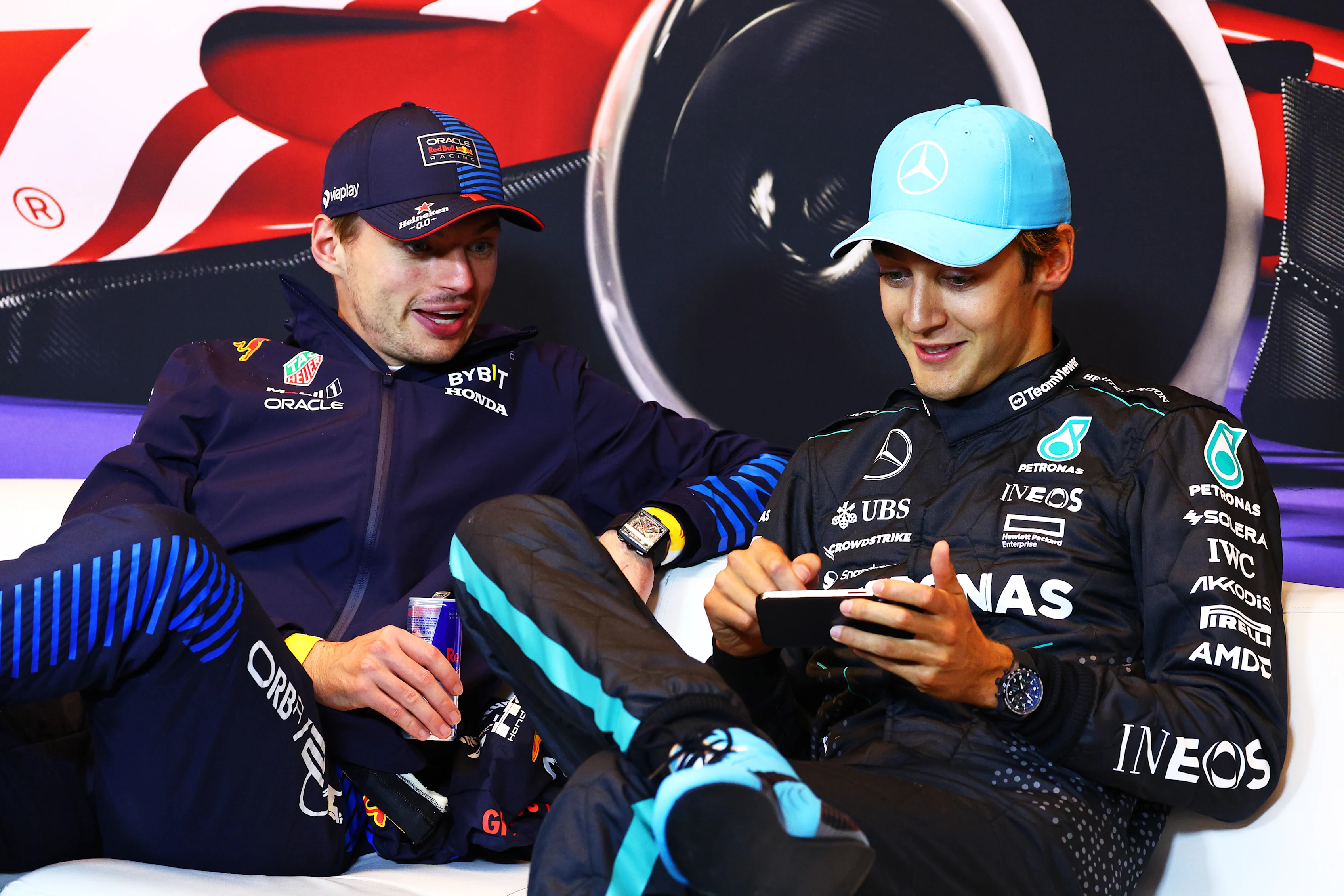 MONTREAL, QUEBEC - JUNE 09: Race winner Max Verstappen of the Netherlands and Oracle Red Bull Racing and Third placed George Russell of Great Britain and Mercedes attend the press conference after the F1 Grand Prix of Canada at Circuit Gilles Villeneuve on June 09, 2024 in Montreal, Quebec. (Photo by Clive Rose/Getty Images)