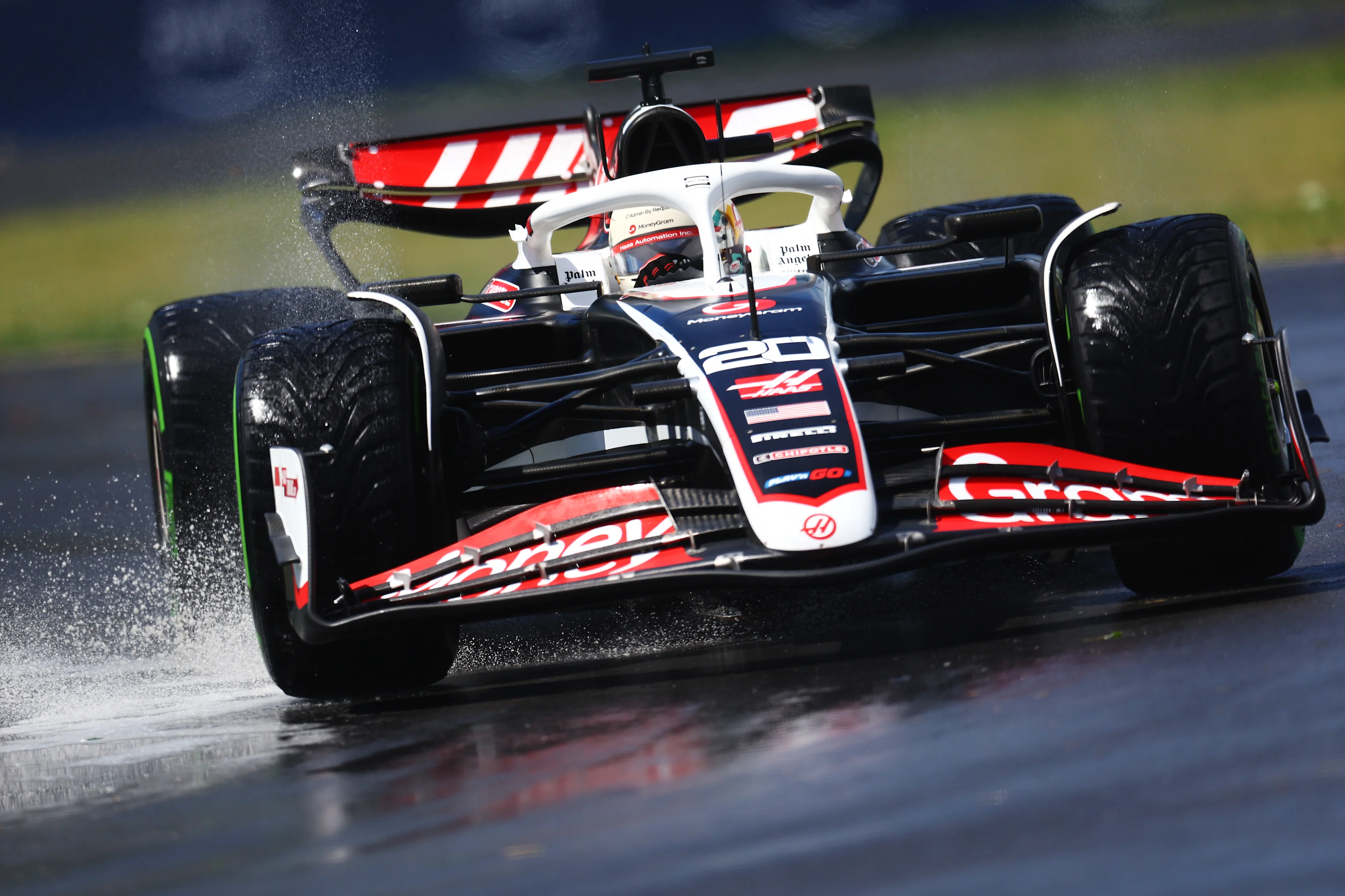 MONTREAL, QUEBEC - JUNE 07: Kevin Magnussen of Denmark driving the (20) Haas F1 VF-24 Ferrari runs through a puddle on track during practice ahead of the F1 Grand Prix of Canada at Circuit Gilles Villeneuve on June 07, 2024 in Montreal, Quebec. (Photo by Clive Rose/Getty Images)