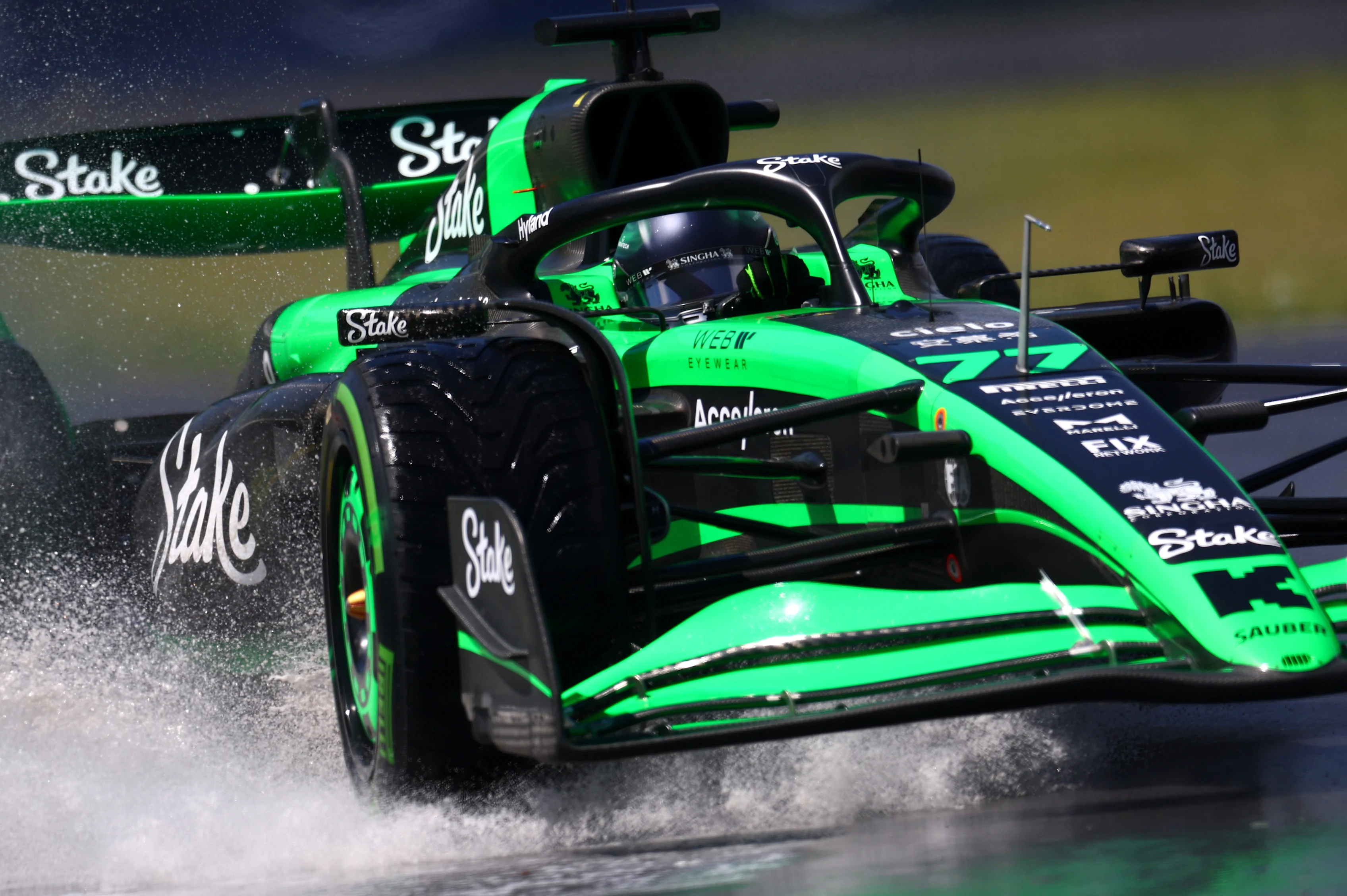 MONTREAL, QUEBEC - JUNE 07: Valtteri Bottas of Finland driving the (77) Kick Sauber C44 Ferrari runs through a puddle on track during practice ahead of the F1 Grand Prix of Canada at Circuit Gilles Villeneuve on June 07, 2024 in Montreal, Quebec. (Photo by Clive Rose/Getty Images)