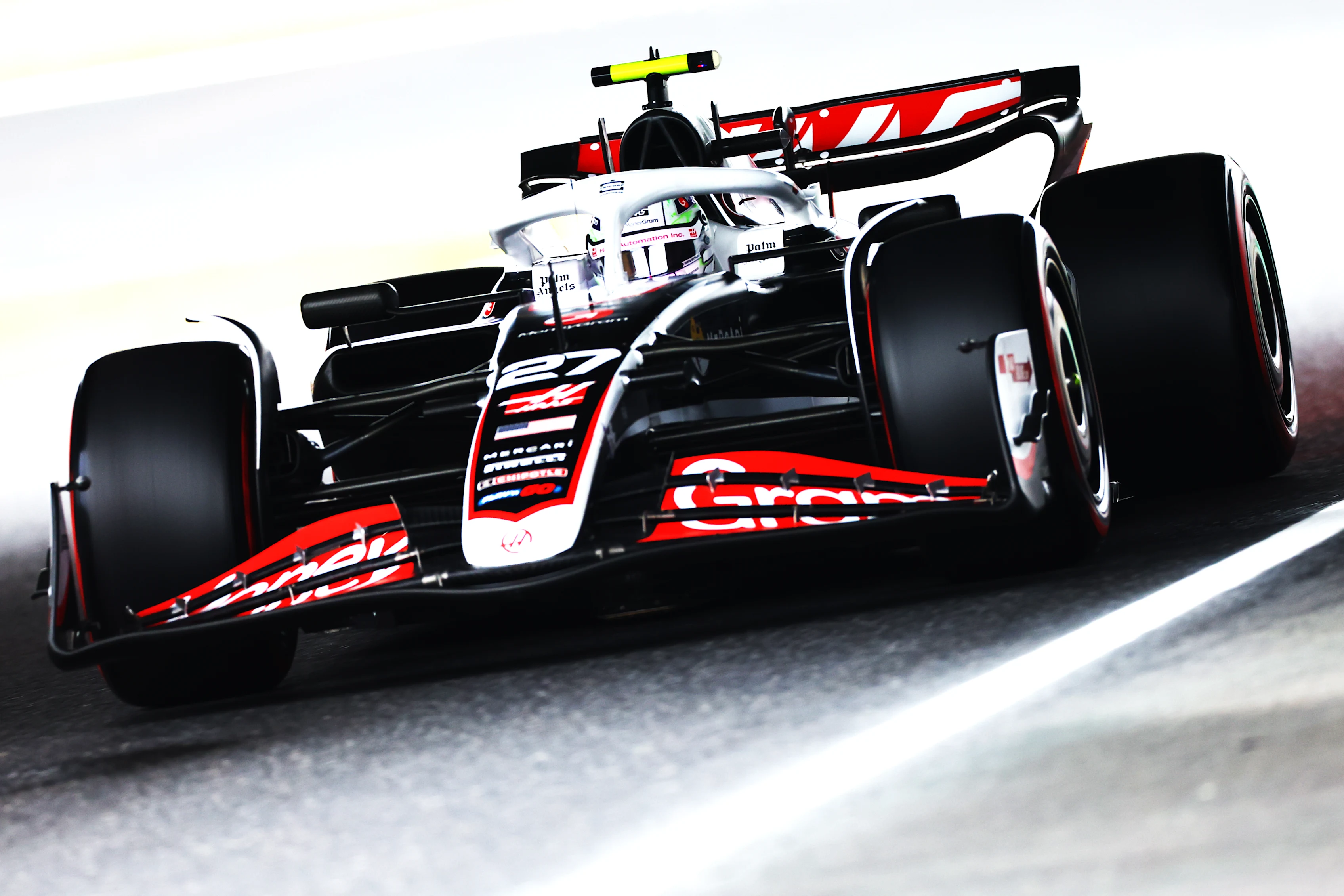 SUZUKA, JAPAN - APRIL 05: Nico Hulkenberg of Germany driving the (27) Haas F1 VF-24 Ferrari on track during practice ahead of the F1 Grand Prix of Japan at Suzuka International Racing Course on April 05, 2024 in Suzuka, Japan. (Photo by Mark Thompson/Getty Images)