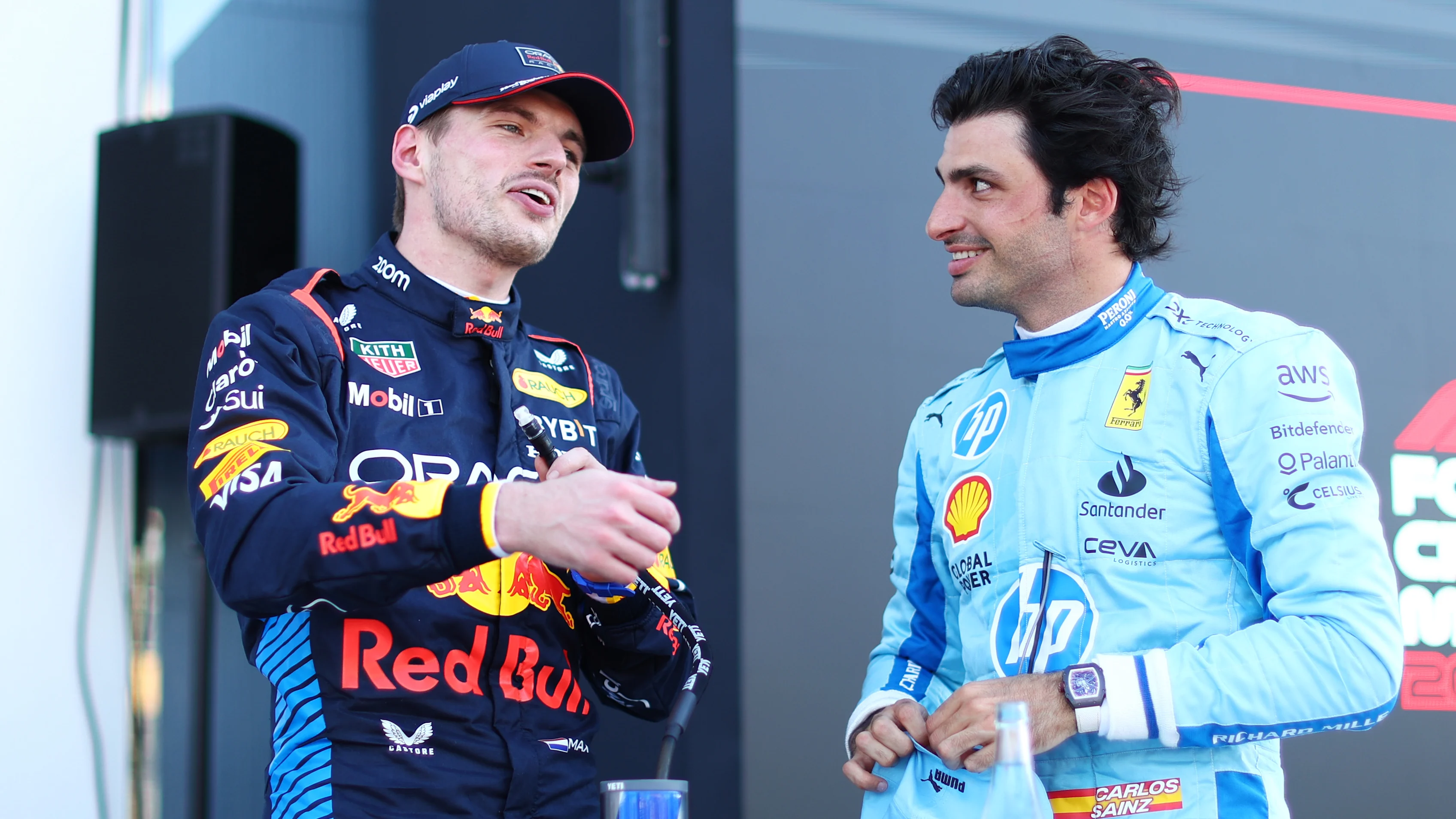MIAMI, FLORIDA - MAY 04: Pole position qualifier Max Verstappen of the Netherlands and Oracle Red Bull Racing and Third placed qualifier Carlos Sainz of Spain and Ferrari talk in parc ferme during qualifying ahead of the F1 Grand Prix of Miami at Miami International Autodrome on May 04, 2024 in Miami, Florida. (Photo by Clive Rose - Formula 1/Formula 1 via Getty Images)