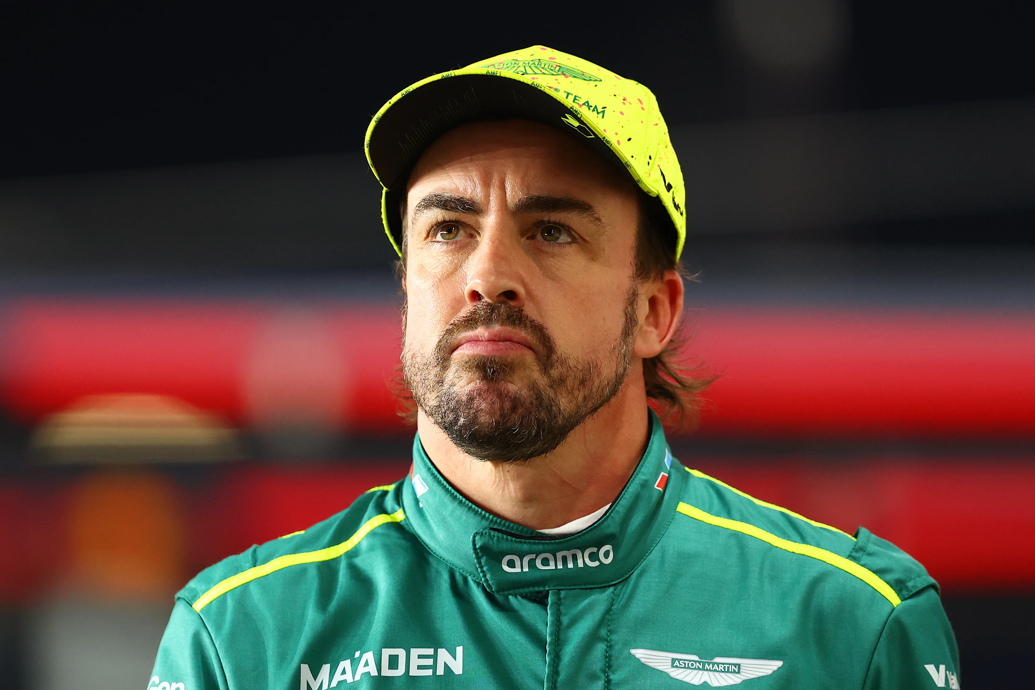 LUSAIL CITY, QATAR - NOVEMBER 29: 11th placed qualifier Fernando Alonso of Spain and Aston Martin F1 Team walks in parc ferme during Sprint Qualifying ahead of the F1 Grand Prix of Qatar at Lusail International Circuit on November 29, 2024 in Lusail City, Qatar. (Photo by Bryn Lennon - Formula 1/Formula 1 via Getty Images)