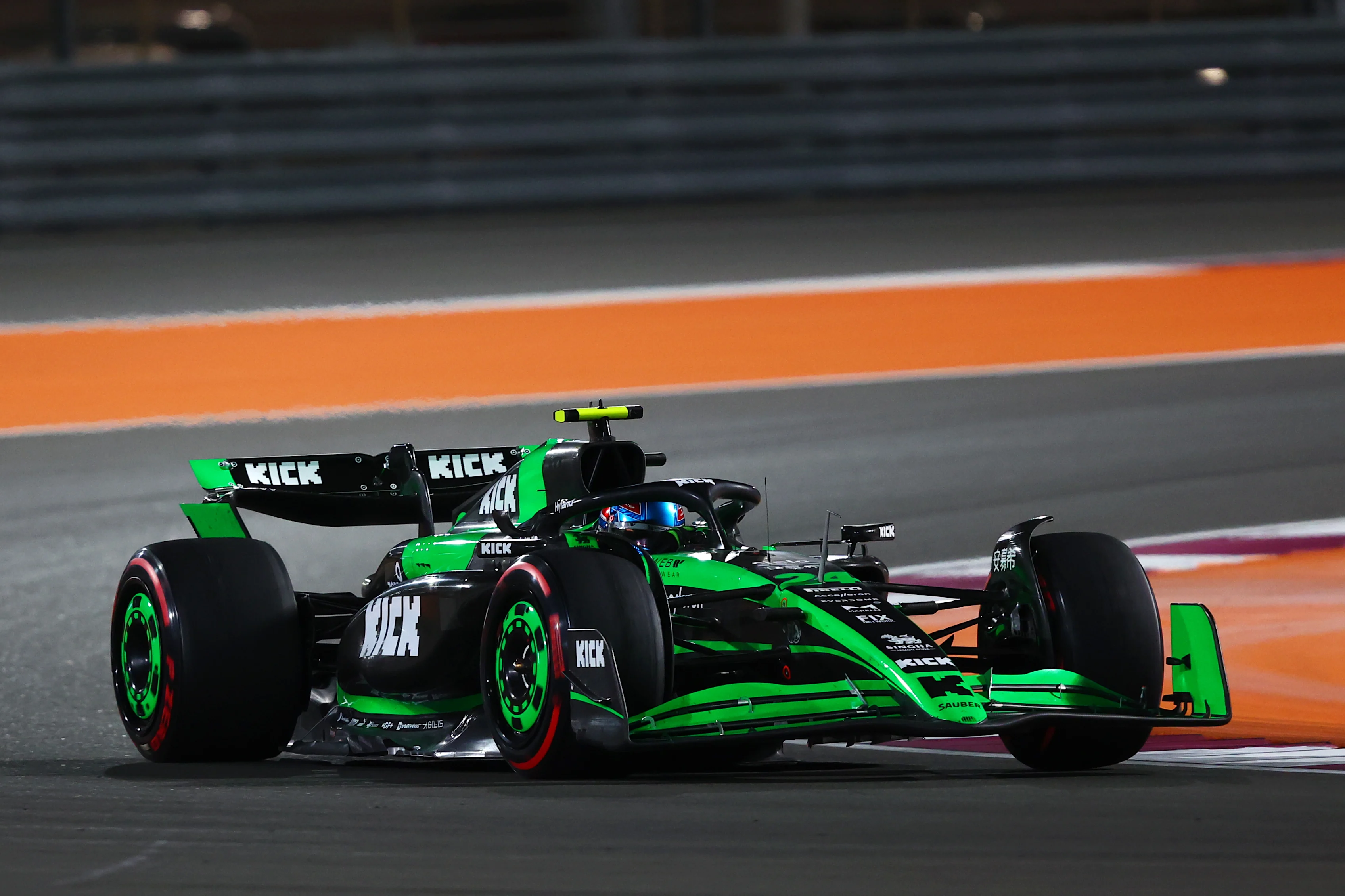 LUSAIL CITY, QATAR - NOVEMBER 30: Zhou Guanyu of China driving the (24) Kick Sauber C44 Ferrari on