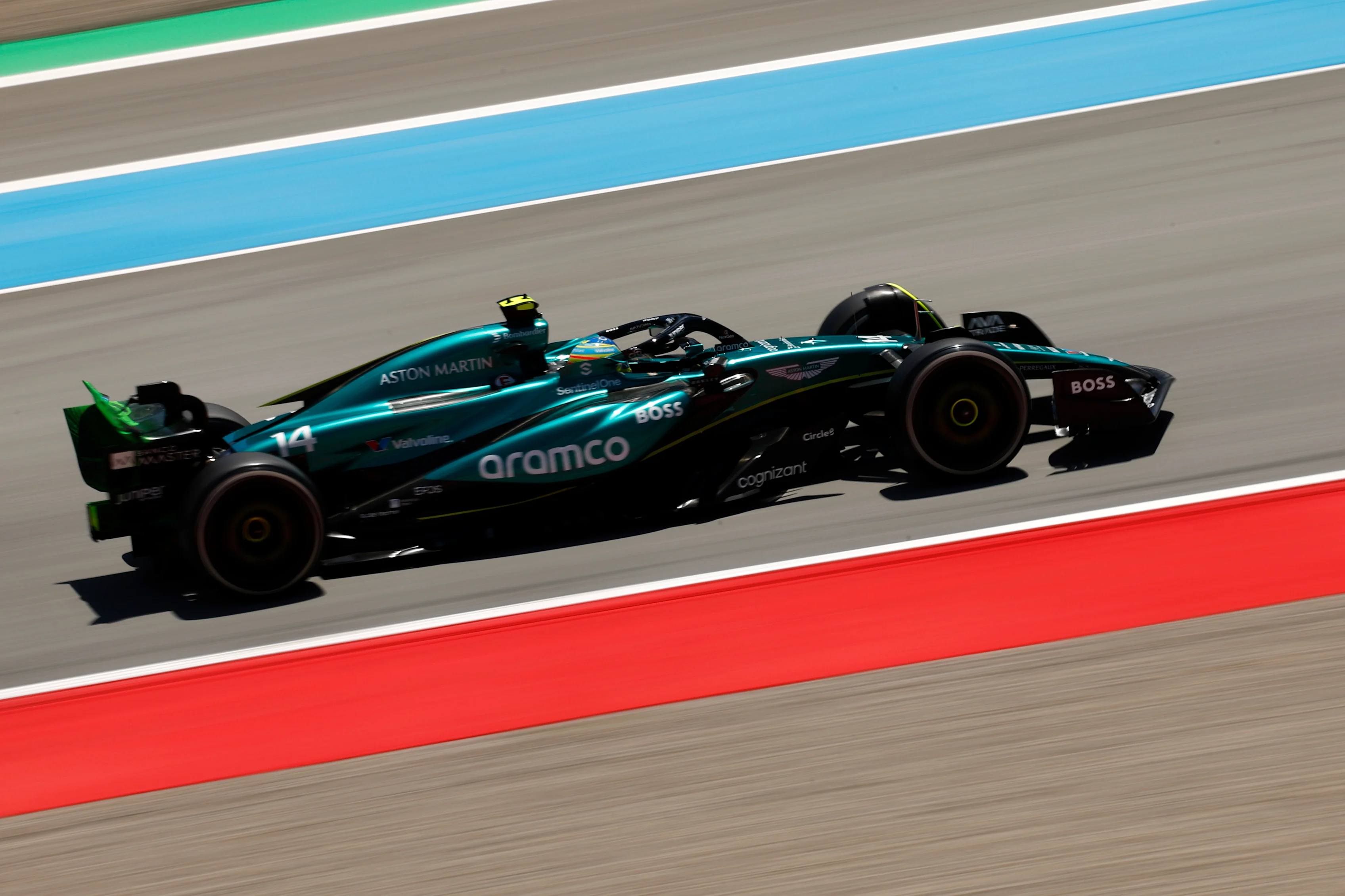 BARCELONA, SPAIN - JUNE 21: Fernando Alonso of Spain driving the (14) Aston Martin AMR24 Mercedes on track during practice ahead of the F1 Grand Prix of Spain at Circuit de Barcelona-Catalunya on June 21, 2024 in Barcelona, Spain. (Photo by Chris Graythen/Getty Images)