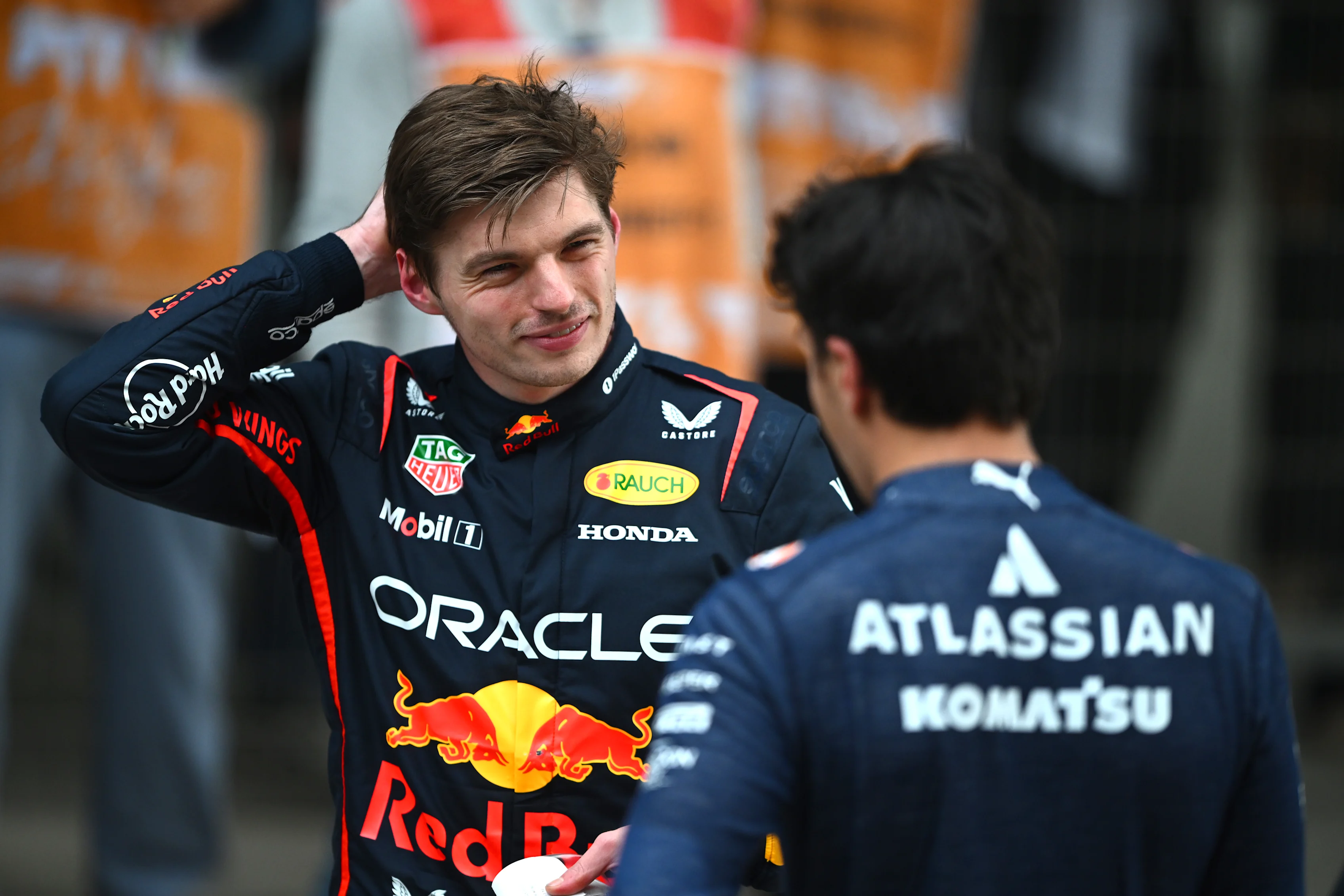 SHANGHAI, CHINA - MARCH 23: Fourth placed Max Verstappen of the Netherlands and Oracle Red Bull Racing and Ninth placed Alexander Albon of Thailand and Williams talk in parc ferme during the F1 Grand Prix of China at Shanghai International Circuit on March 23, 2025 in Shanghai, China. (Photo by Rudy Carezzevoli/Getty Images)