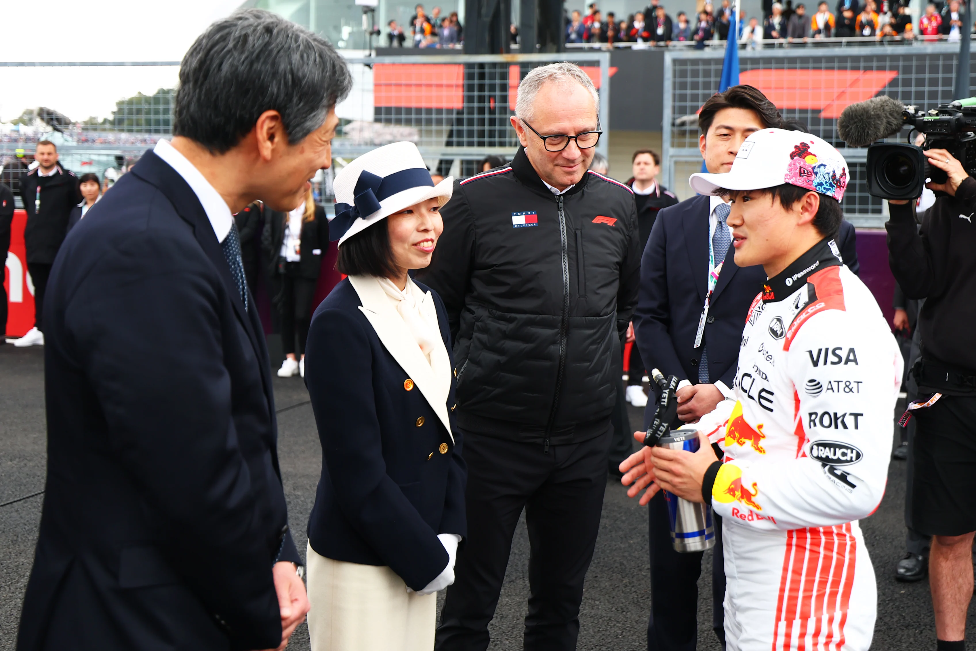 SUZUKA, JAPAN - APRIL 06: Princess Akiko of Mikasa meets Yuki Tsunoda of Japan and Oracle Red Bull