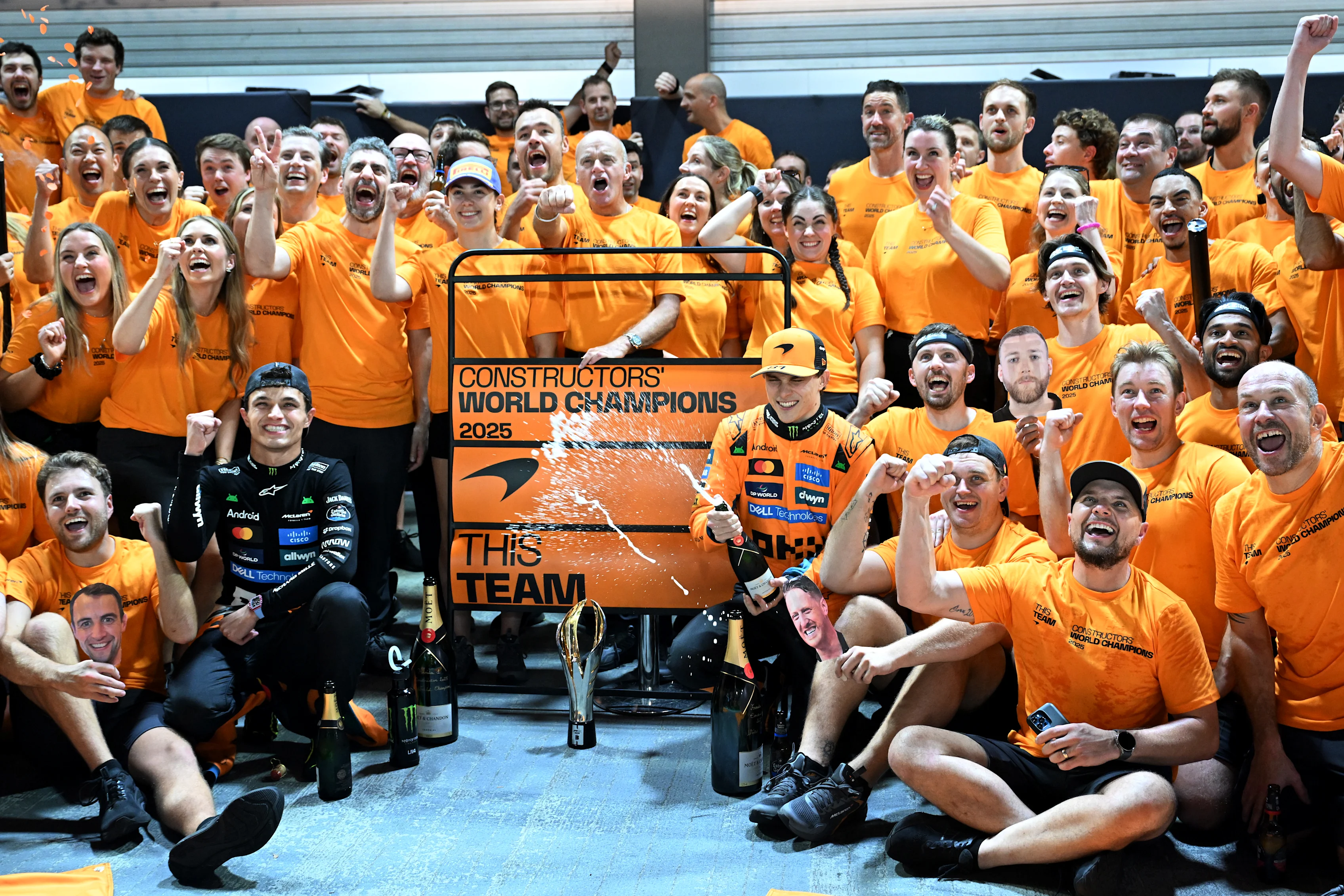 SINGAPORE, SINGAPORE - OCTOBER 05: Lando Norris of Great Britain and McLaren Oscar Piastri of