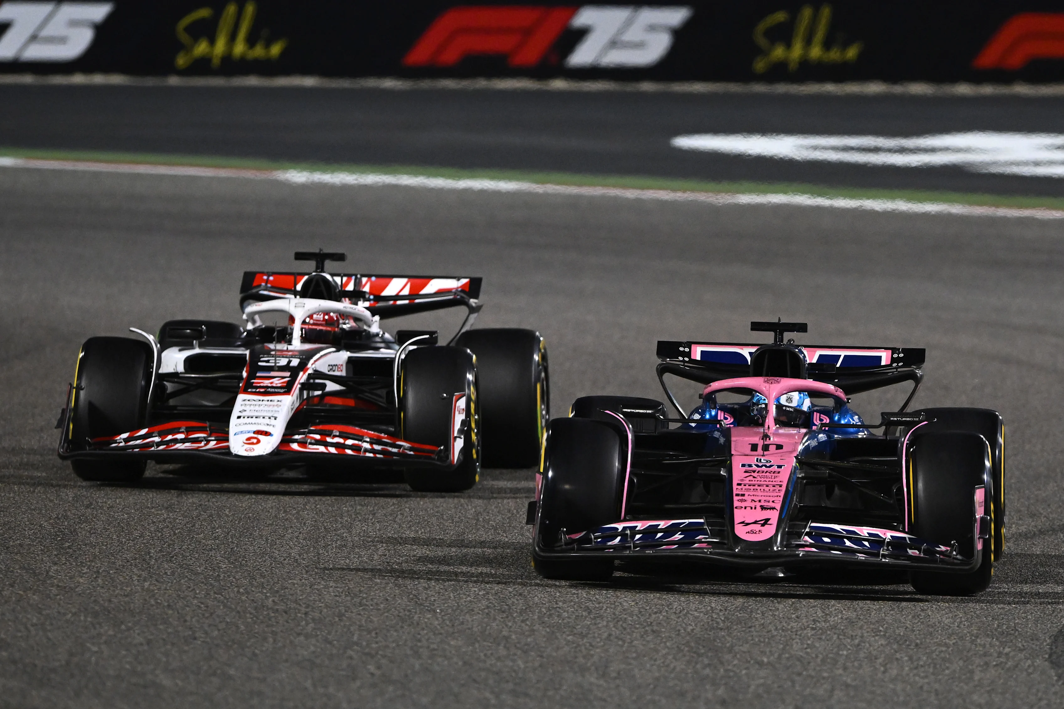 BAHRAIN, BAHRAIN - APRIL 13: Pierre Gasly of France driving the (10) Alpine F1 A525 Renault leads Esteban Ocon of France driving the (31) Haas F1 VF-25 Ferrari on track during the F1 Grand Prix of Bahrain at Bahrain International Circuit on April 13, 2025 in Bahrain, Bahrain. (Photo by Rudy Carezzevoli/Getty Images)