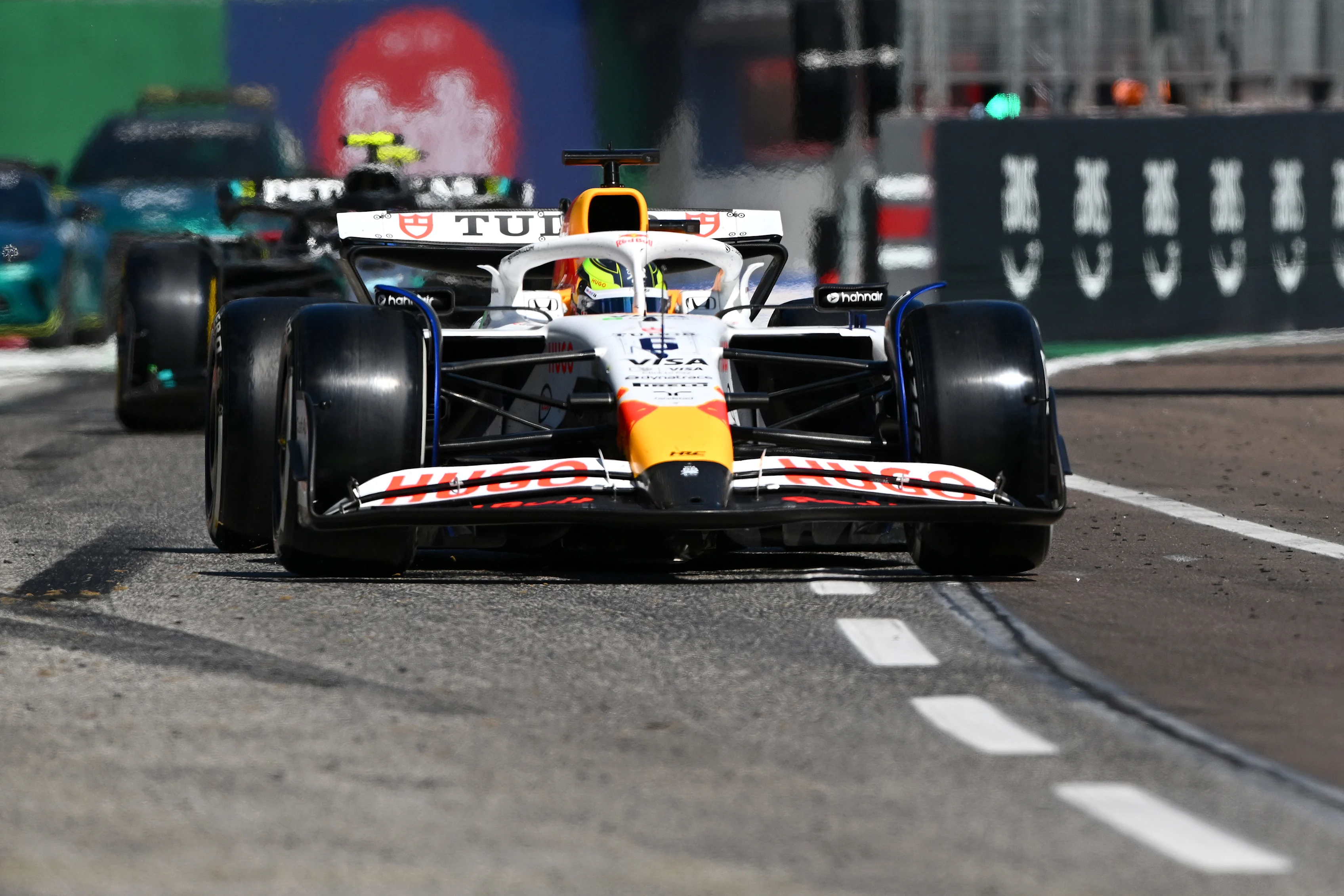 IMOLA, ITALY - MAY 18: Isack Hadjar of France driving the (6) Visa Cash App Racing Bulls VCARB 02 leads Andrea Kimi Antonelli of Italy driving the (12) Mercedes AMG Petronas F1 Team W16 out of the pitlane during the F1 Grand Prix of Emilia-Romagna at Autodromo Internazionale Enzo e Dino Ferrari on May 18, 2025 in Imola, Italy. (Photo by Rudy Carezzevoli/Getty Images)