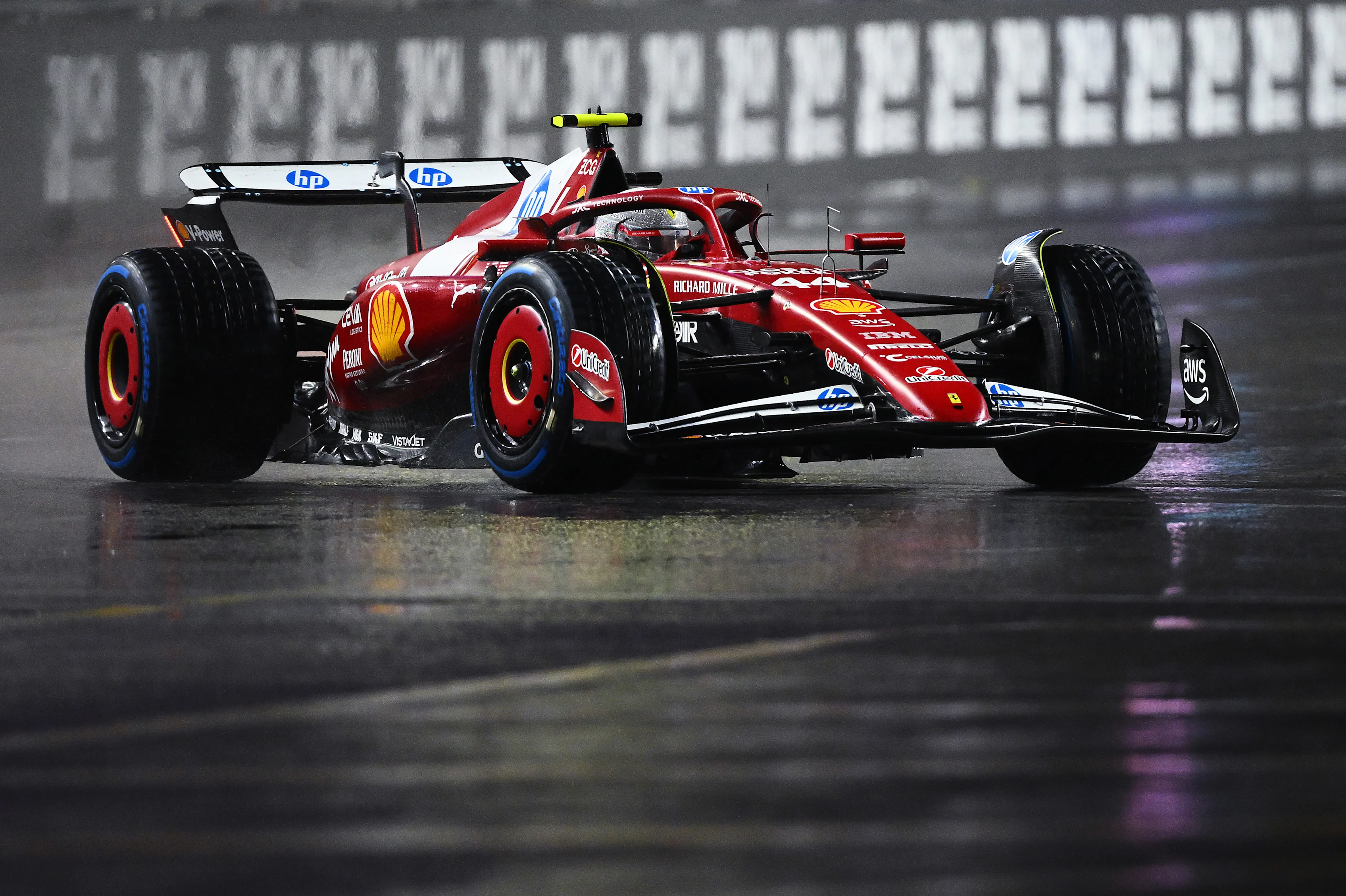 LAS VEGAS, NEVADA - NOVEMBER 21: Lewis Hamilton of Great Britain driving the (44) Scuderia Ferrari
