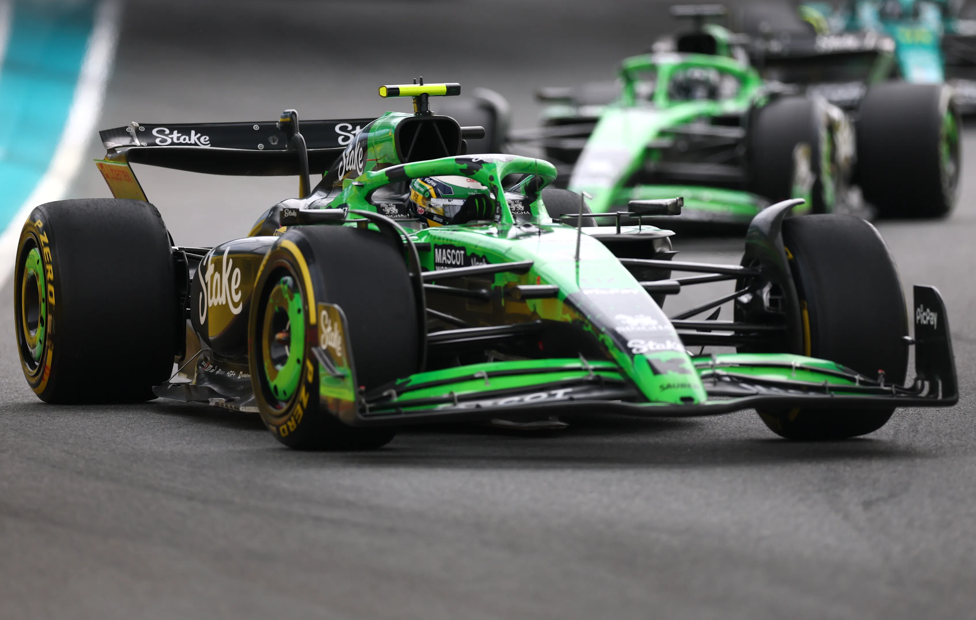 MIAMI, FLORIDA - MAY 04: Gabriel Bortoleto of Brazil driving the (5) Kick Sauber C45 Ferrari leads Nico Hulkenberg of Germany driving the (27) Kick Sauber C45 Ferrari on track during the F1 Grand Prix of Miami at Miami International Autodrome on May 04, 2025 in Miami, Florida. (Photo by Clive Rose/Getty Images)