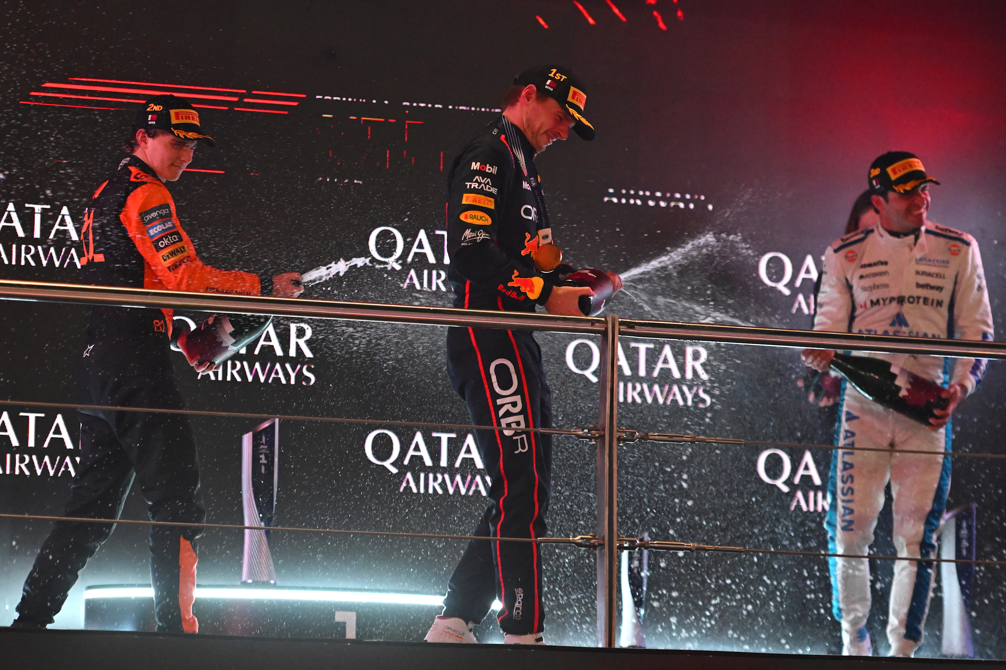 LUSAIL CITY, QATAR - NOVEMBER 30: Race winner Max Verstappen of the Netherlands and Oracle Red Bull