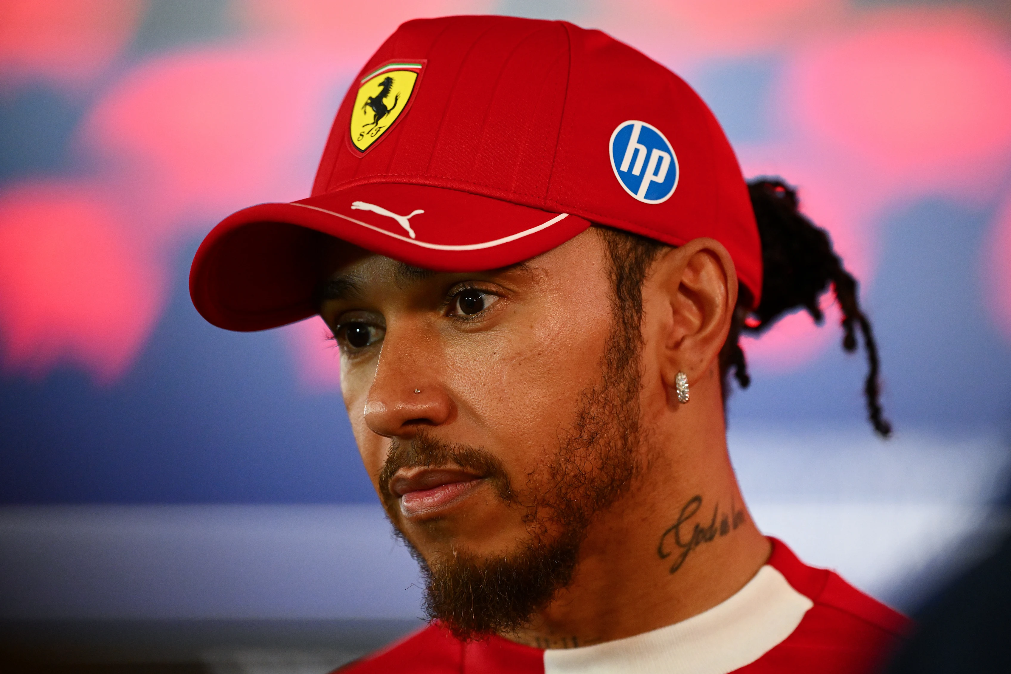LUSAIL CITY, QATAR - NOVEMBER 30: Twelfth placed Lewis Hamilton of Great Britain and Scuderia