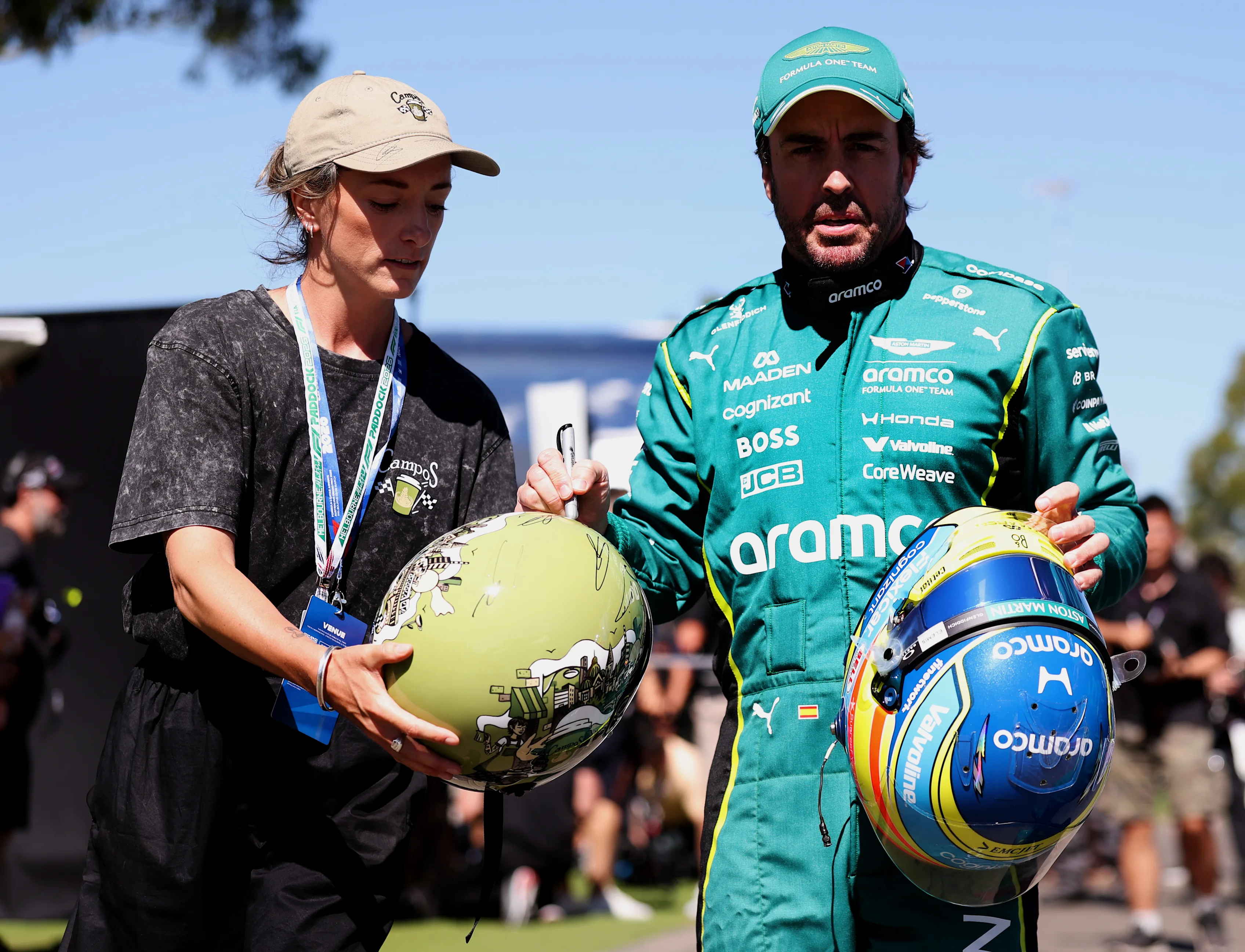 MELBOURNE, AUSTRALIA - MARCH 05: Fernando Alonso of Spain and Aston Martin F1 Team signs an