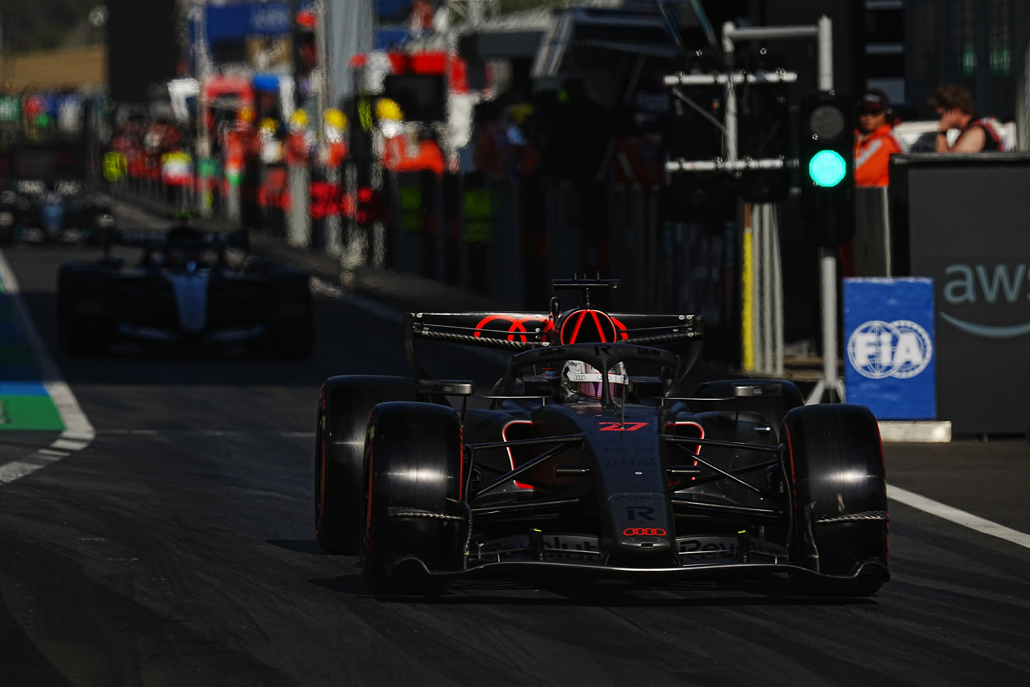SHANGHAI, CHINA - MARCH 14: Nico Hulkenberg of Germany driving the (27) Audi F1 Team R26 leaves the