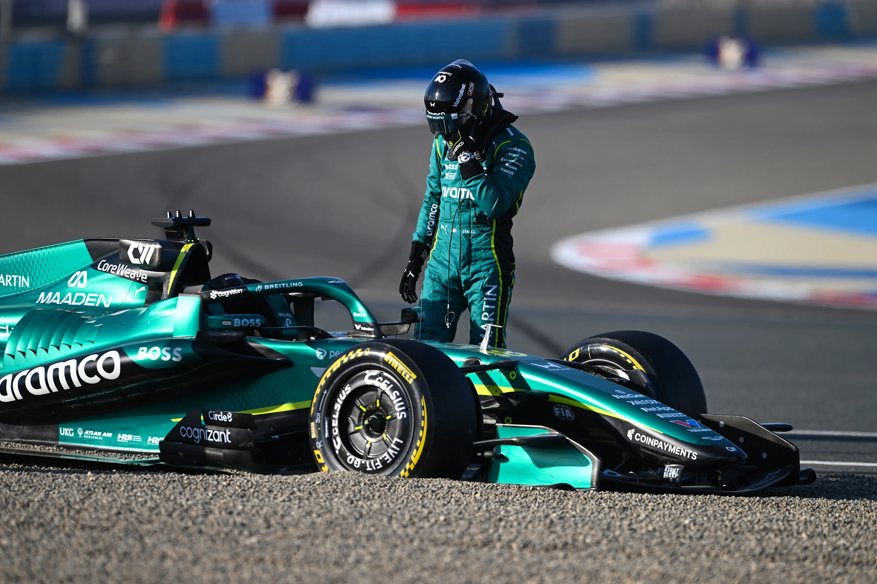 BAHRAIN, BAHRAIN - FEBRUARY 18: Lance Stroll of Canada and Aston Martin F1 Team stands by his car