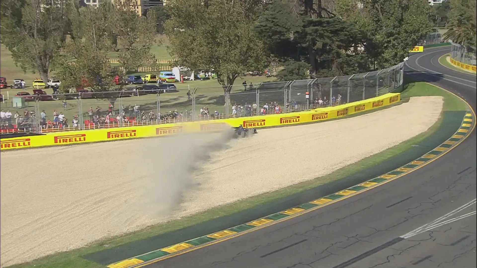 Kevin Magnussen hits the barriers in his McLaren